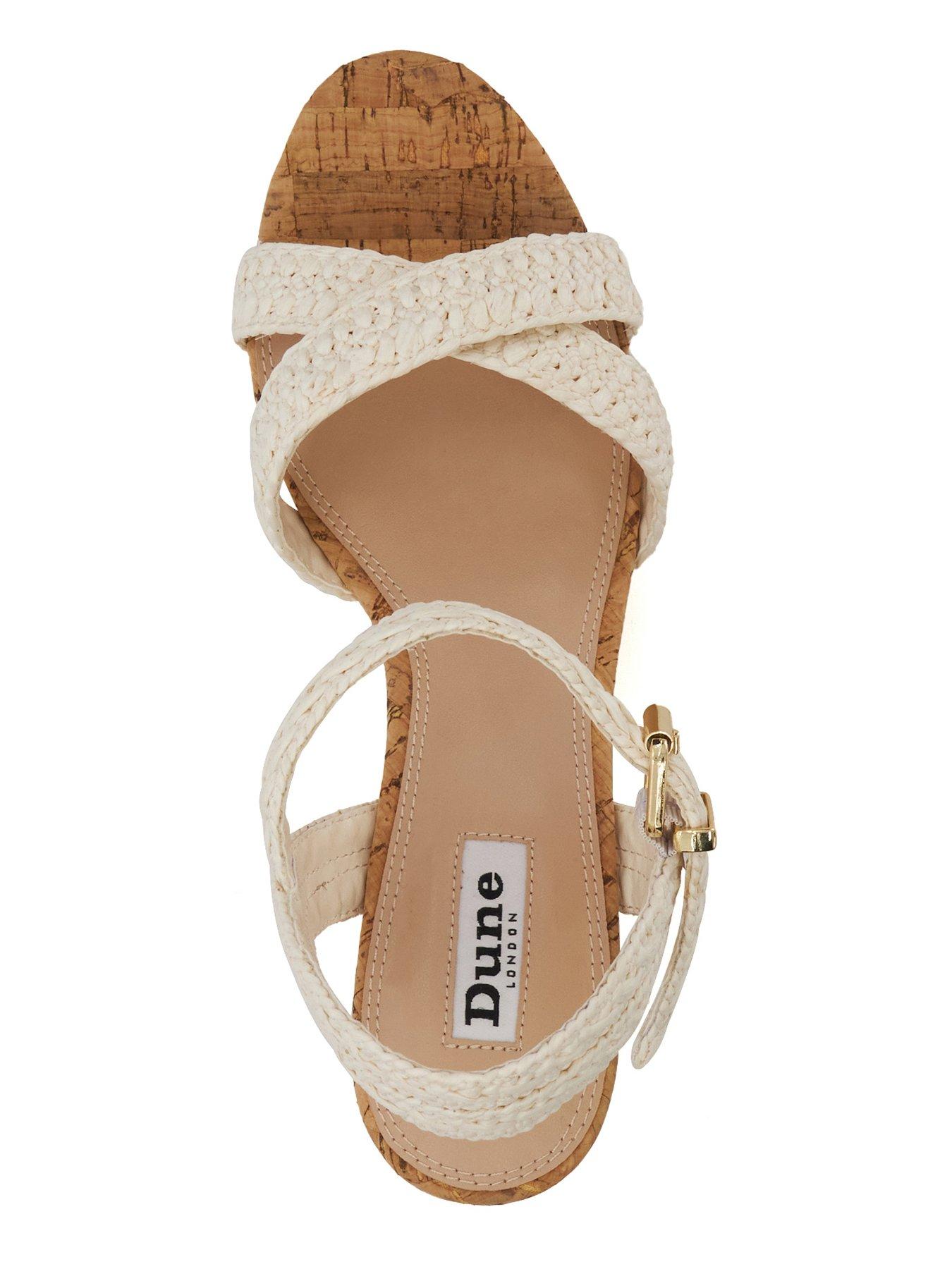 Image 4 of 6 of Dune London Kelisa Braided Cross Strap Cork Wedge Sandals - White
