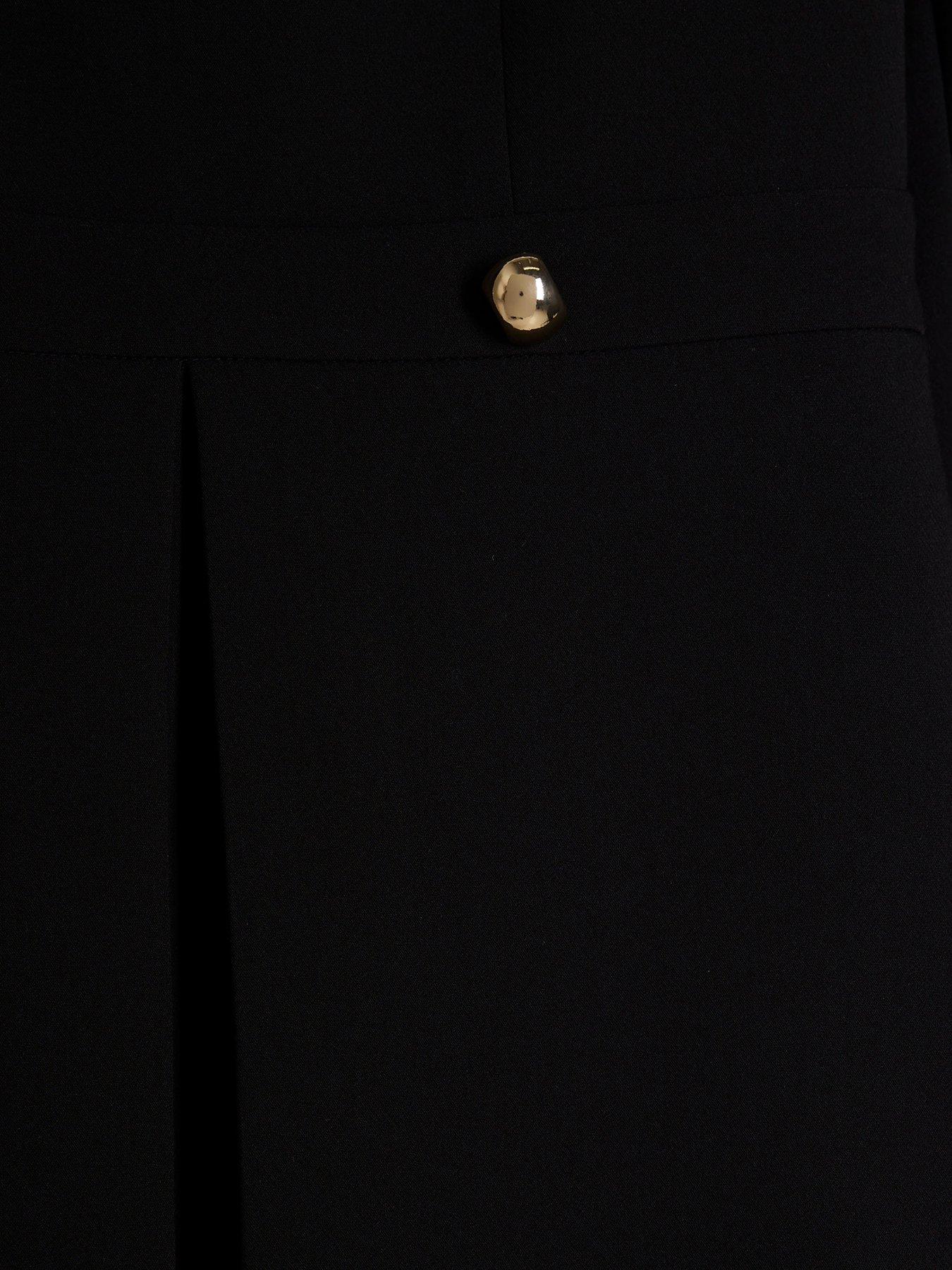 Image 5 of 5 of River Island Peplum Playsuit - Black