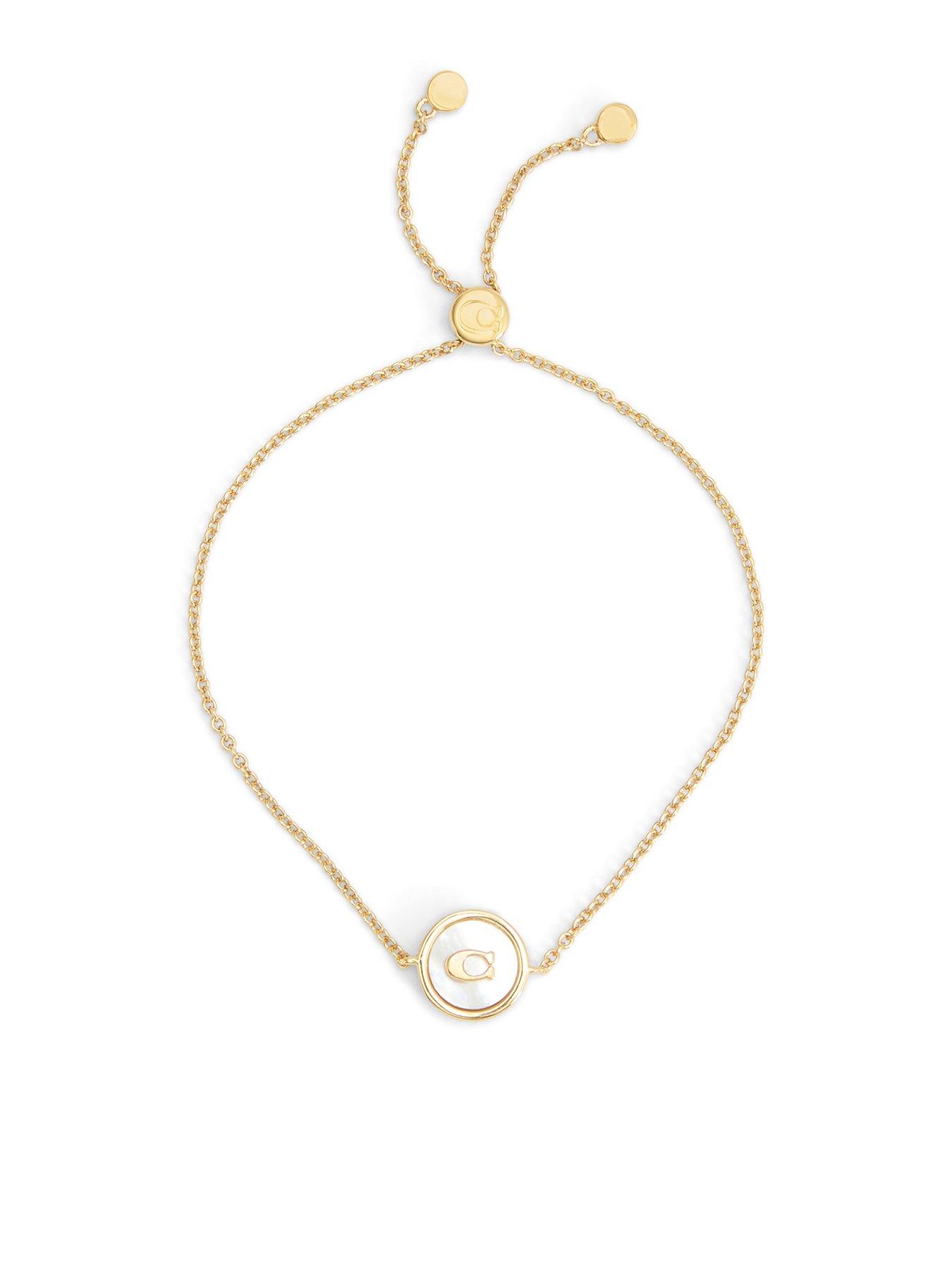 Image 1 of 3 of COACH Signature Mother Of Pearl Coin Slider Bracelet - Gold