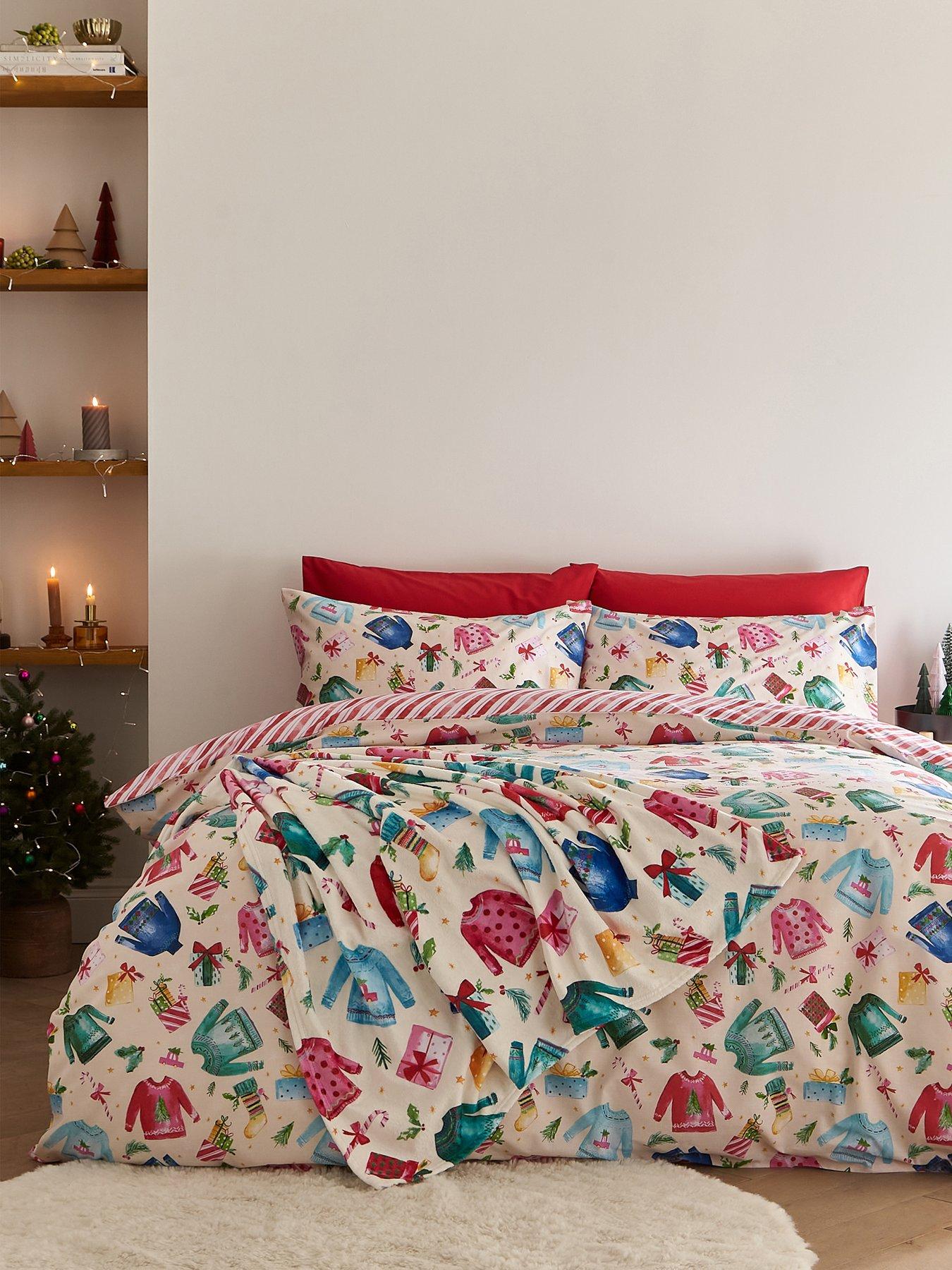 Product photograph of Catherine Lansfield Christmas Jolly Jumpers Duvet Set- King from very.co.uk