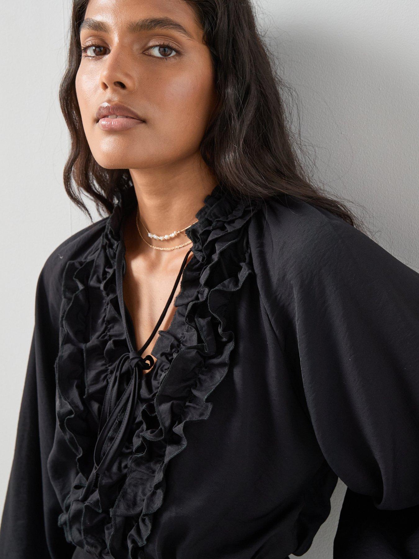 Image 4 of 6 of The Very Collection Ruffle Rib Bottom Blouse - Black