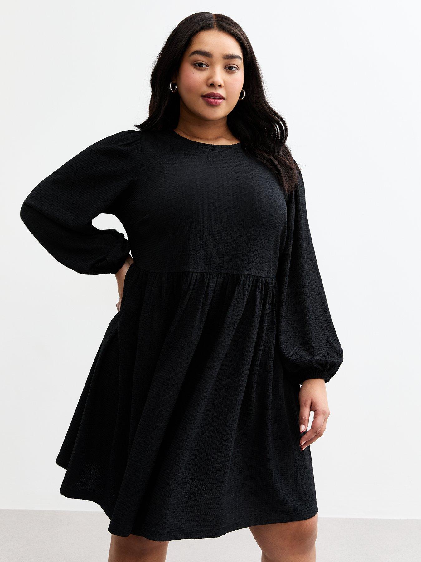Image 1 of 4 of New Look Curves Crinkled Texture Mini Dress - Black