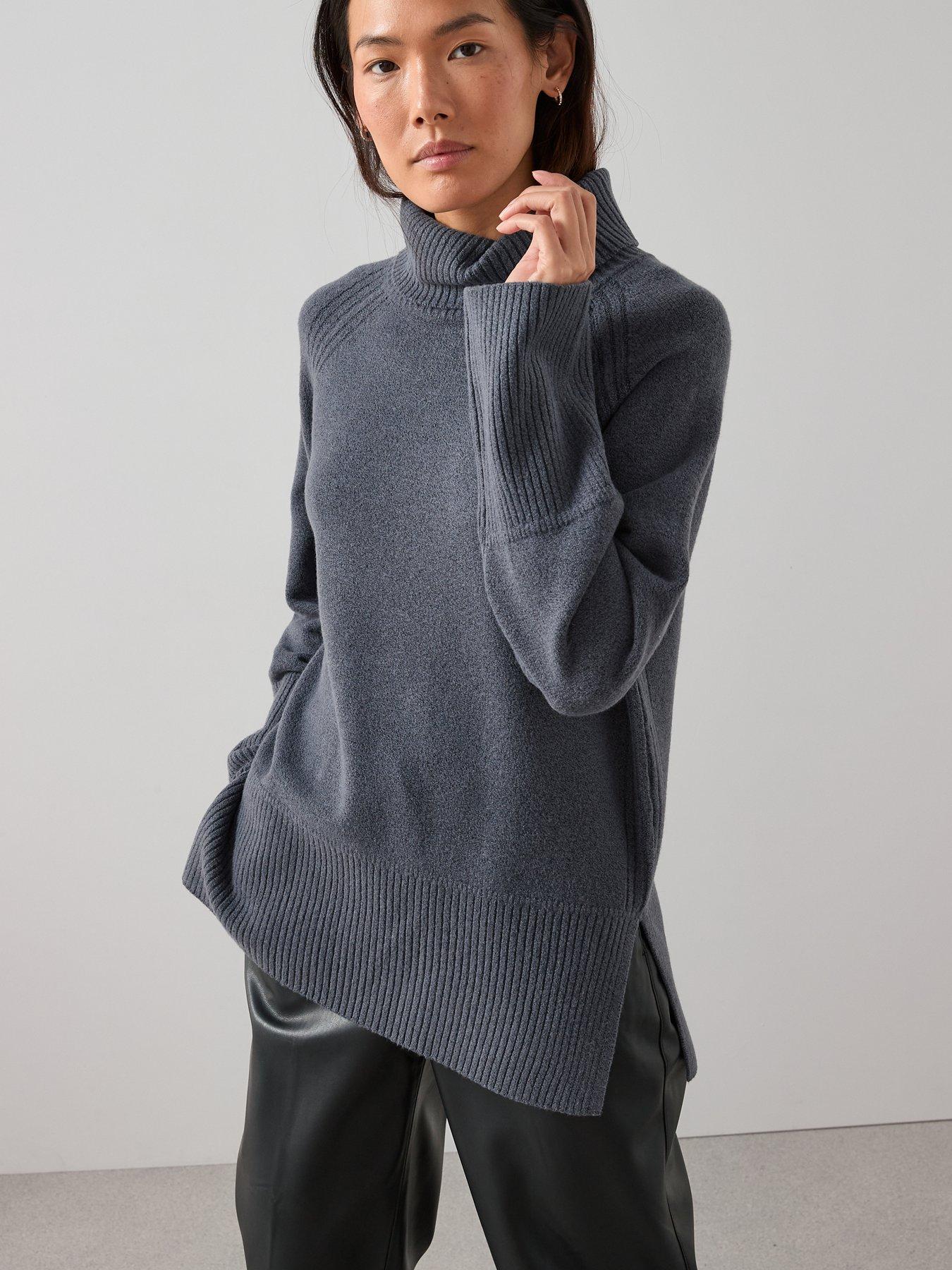 Image 4 of 7 of The Very Collection Cosy Yarn Roll Neck Deep Rib Longline Jumper With Wool - Grey