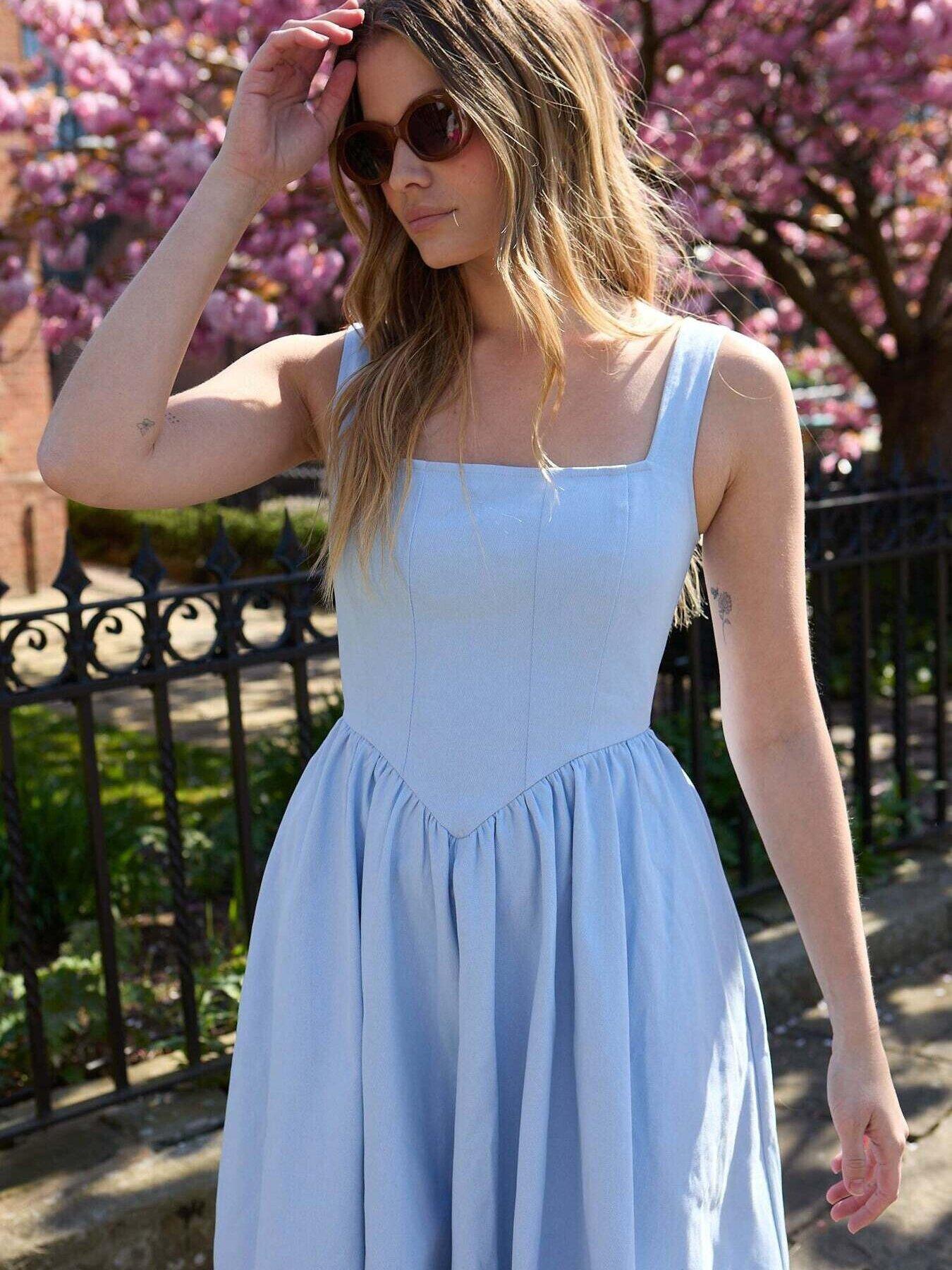 hailey bieber light blue dress Hailey Bieber just wore vintage baby blue Gucci mini dress