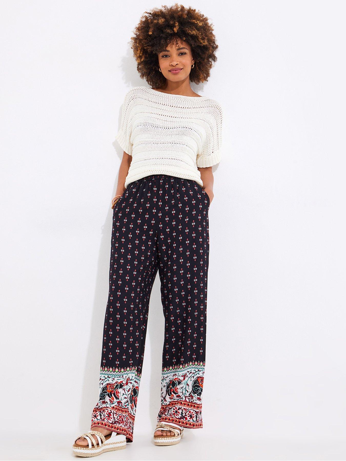 undefined Elegant Elephant Print Wide Leg Trousers - Black