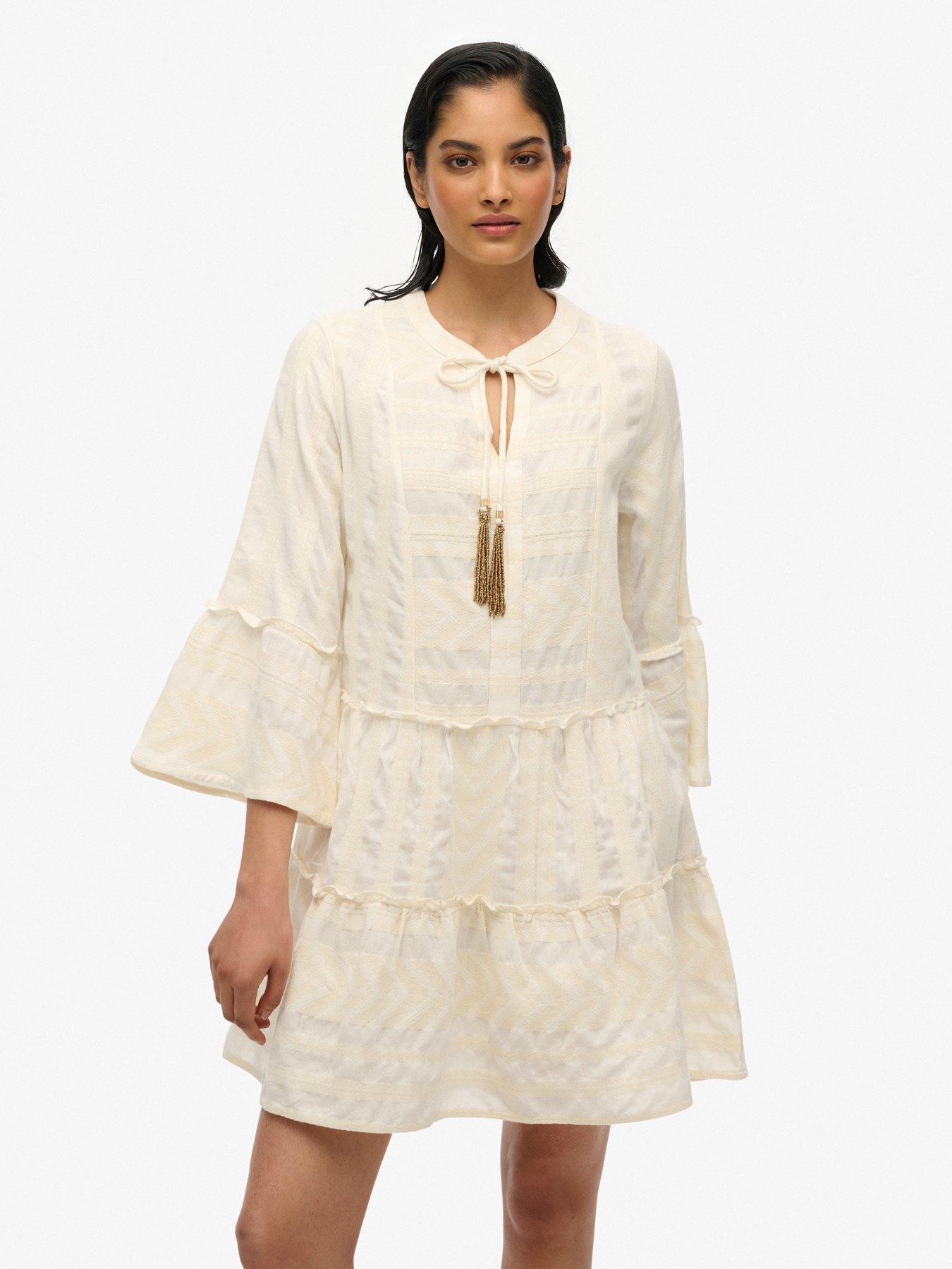 undefined Ibiza Long Sleeve Tiered Mini Dress