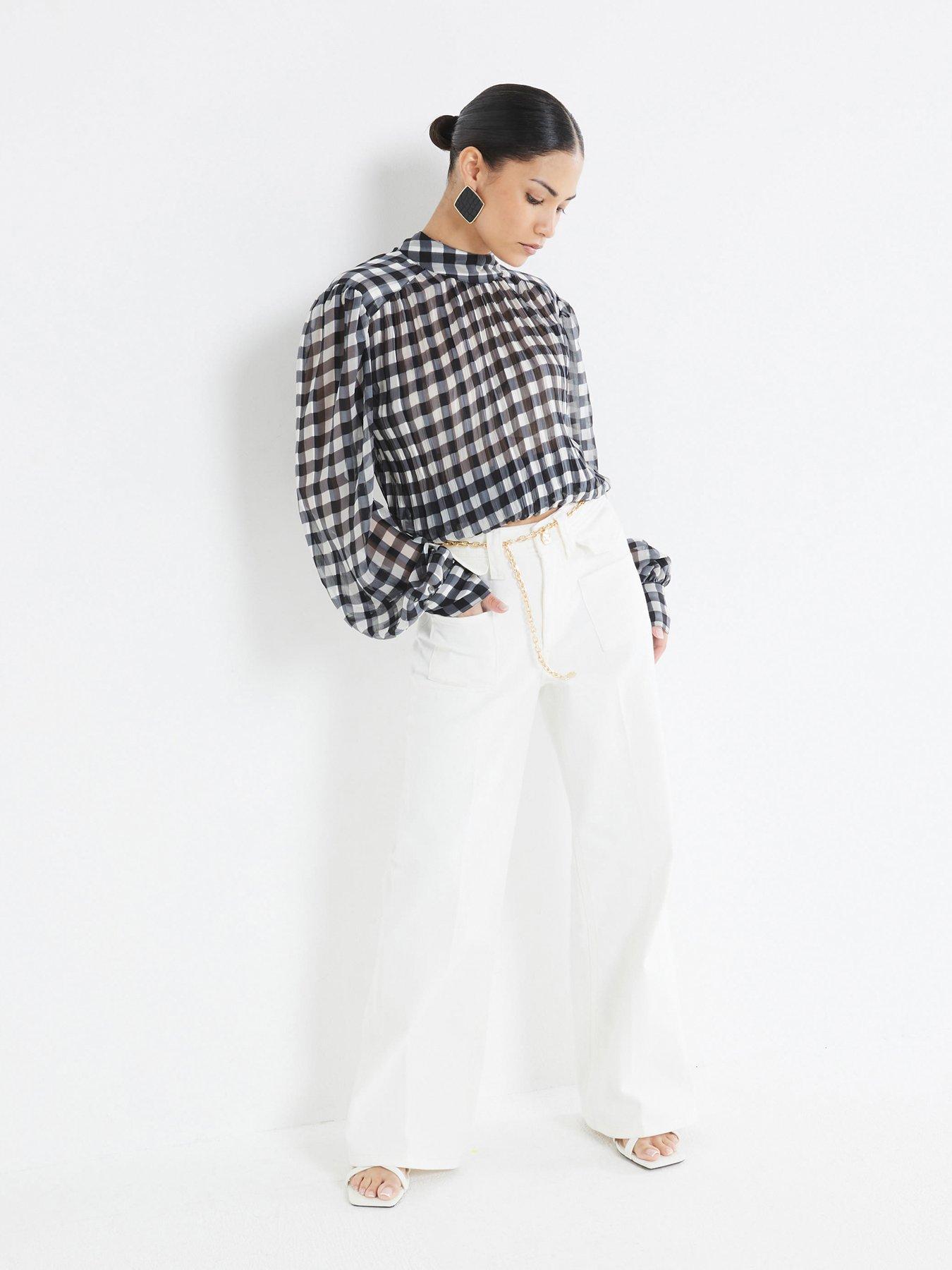 undefined High Rise Relaxed Flared Jeans - White