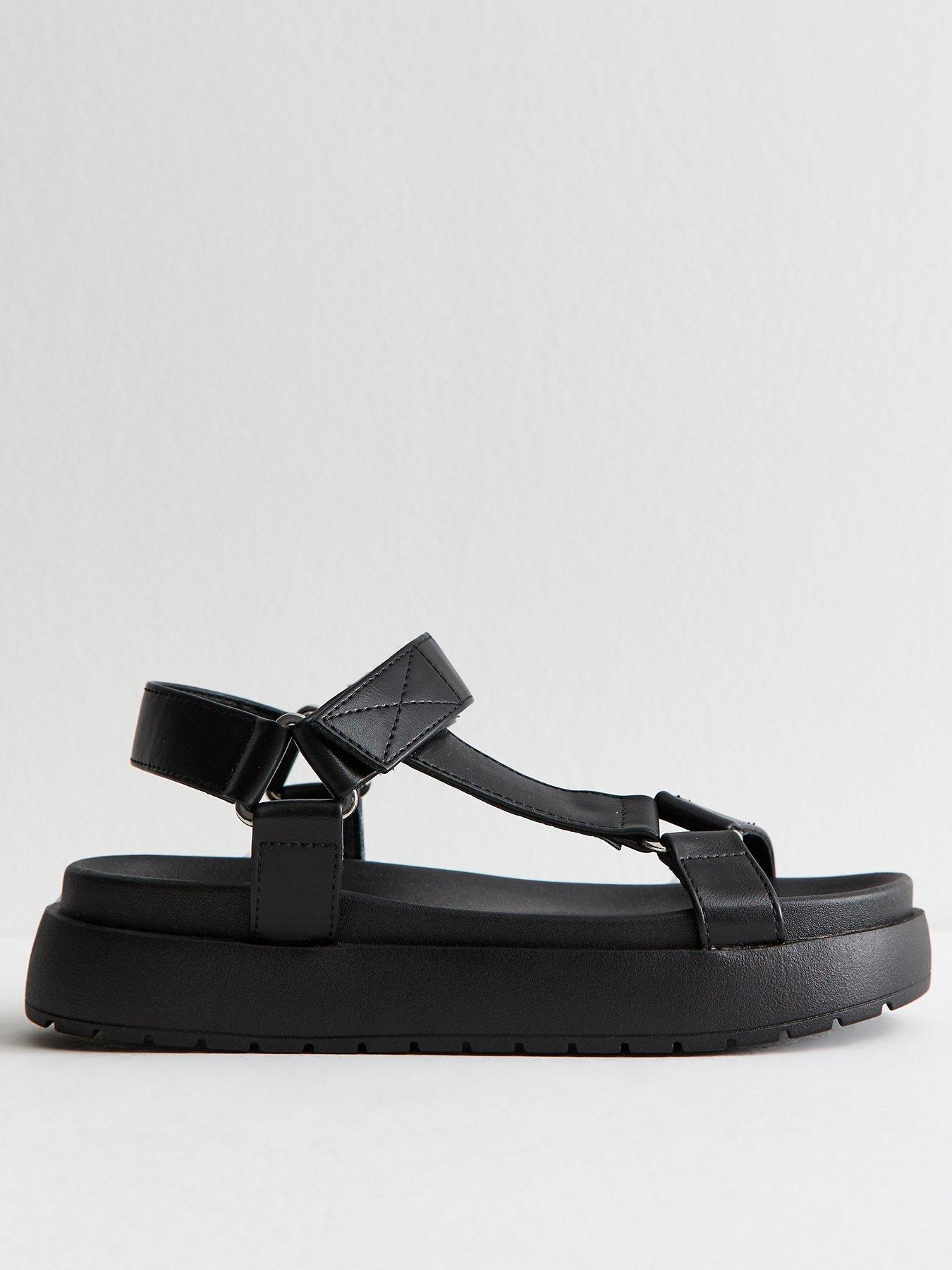 Image 1 of 6 of New Look Black Faux Leather Harness Strap Platform Sandals