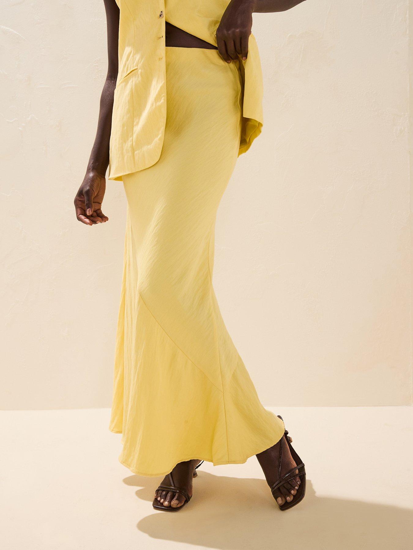 rouge-high-rise-midi-skirt-yellow
