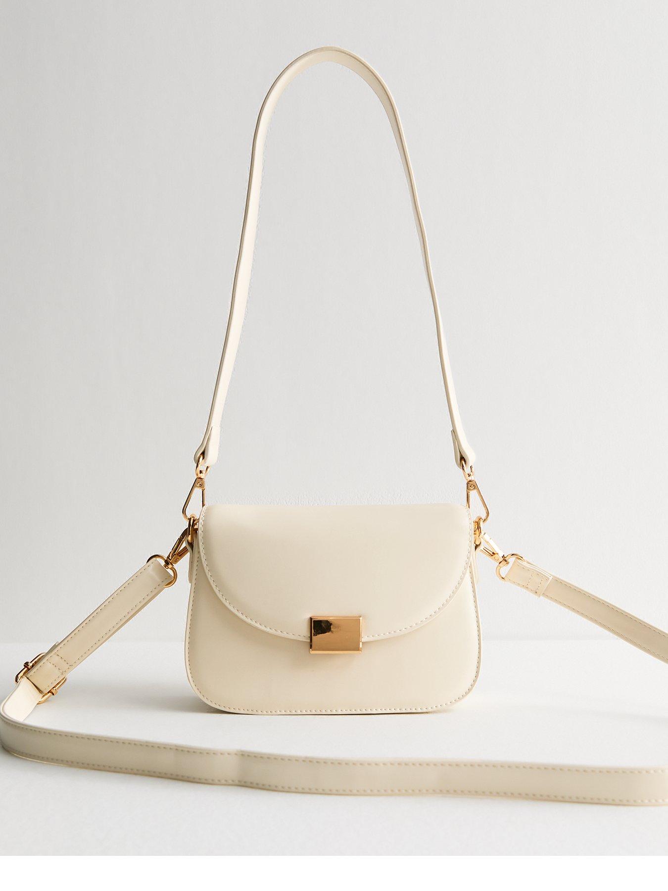 undefined Cream Faux Leather Crossbody Saddle Bag