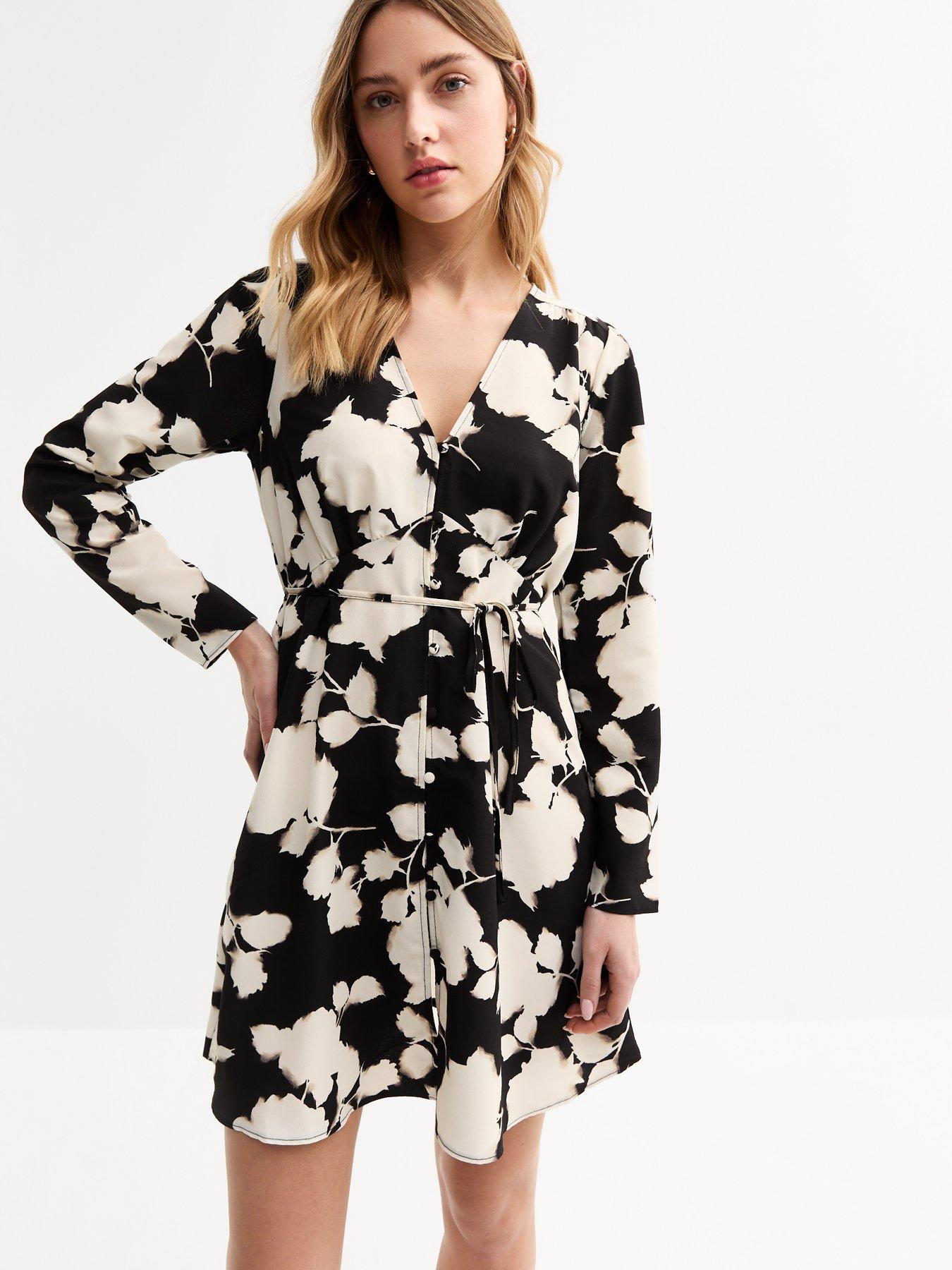 Image 1 of 5 of New Look Blurred Floral Print Mini Shirt Dress - Black