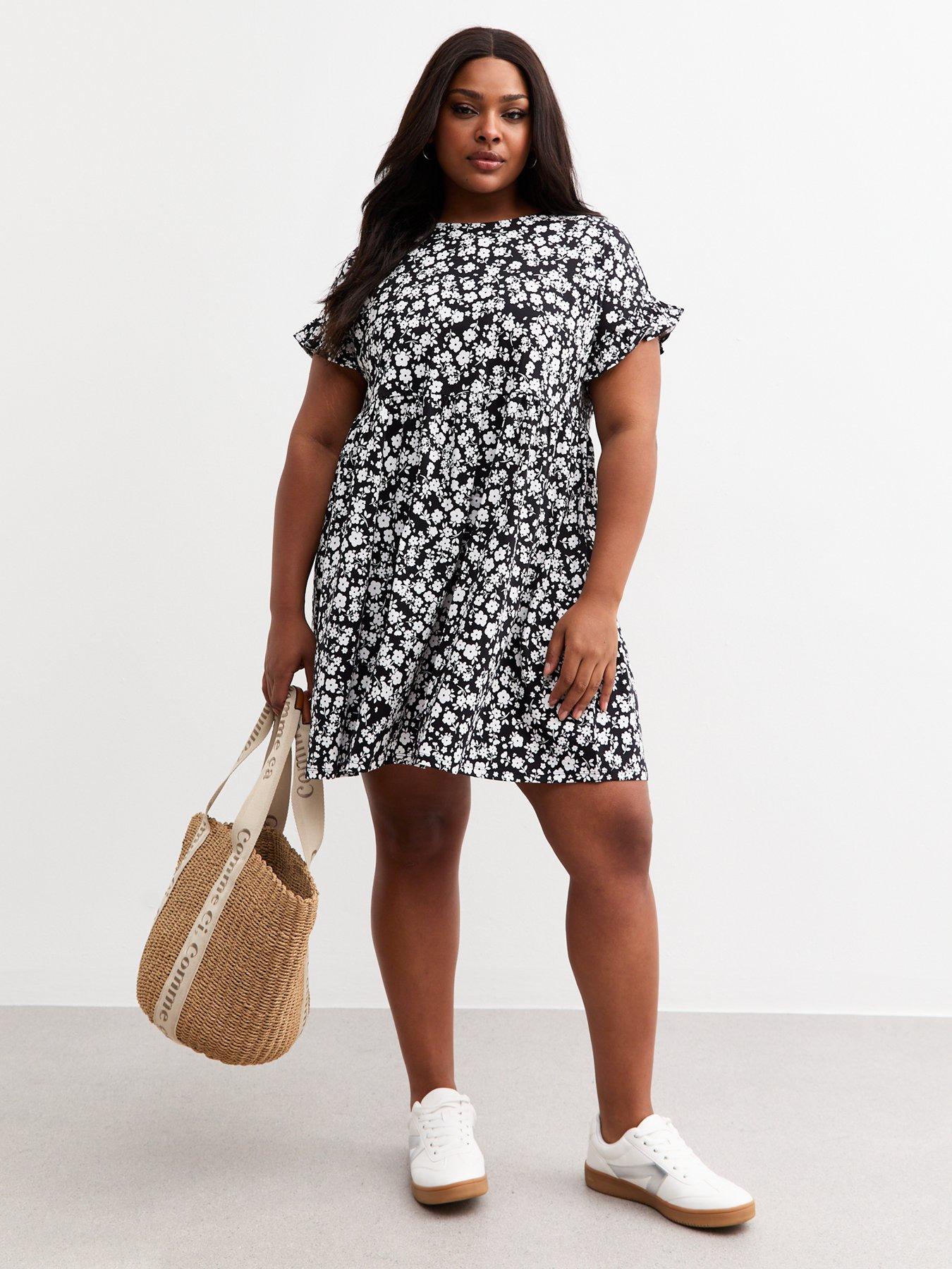 Image 3 of 4 of New Look Curves Black Floral Print Jersey Mini Dress