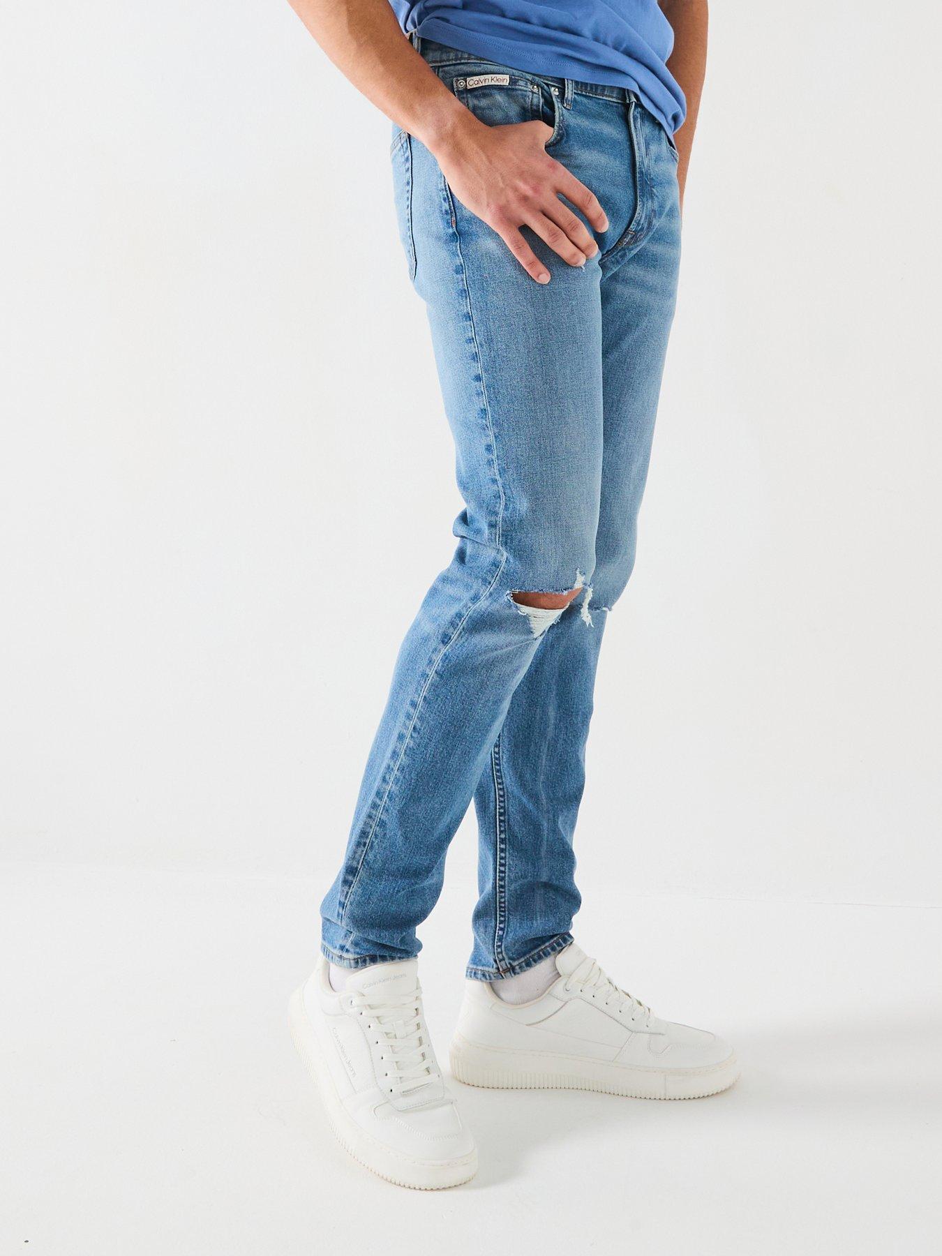undefined Rip & Repair Slim Taper Jeans - Mid Wash