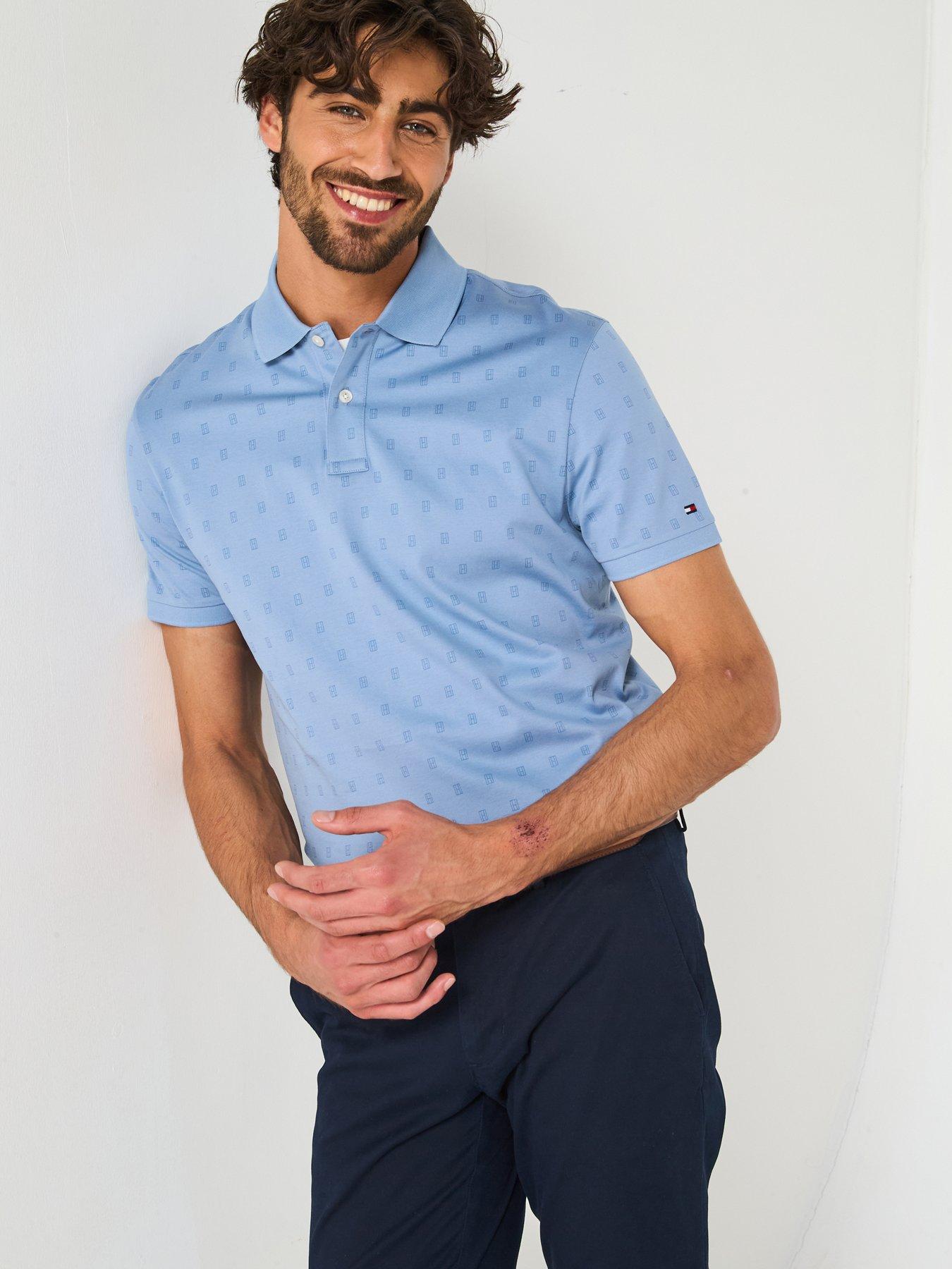 Image 1 of 6 of Tommy Hilfiger All Over Print Interlock Regular Fit Polo Shirt - Light Blue