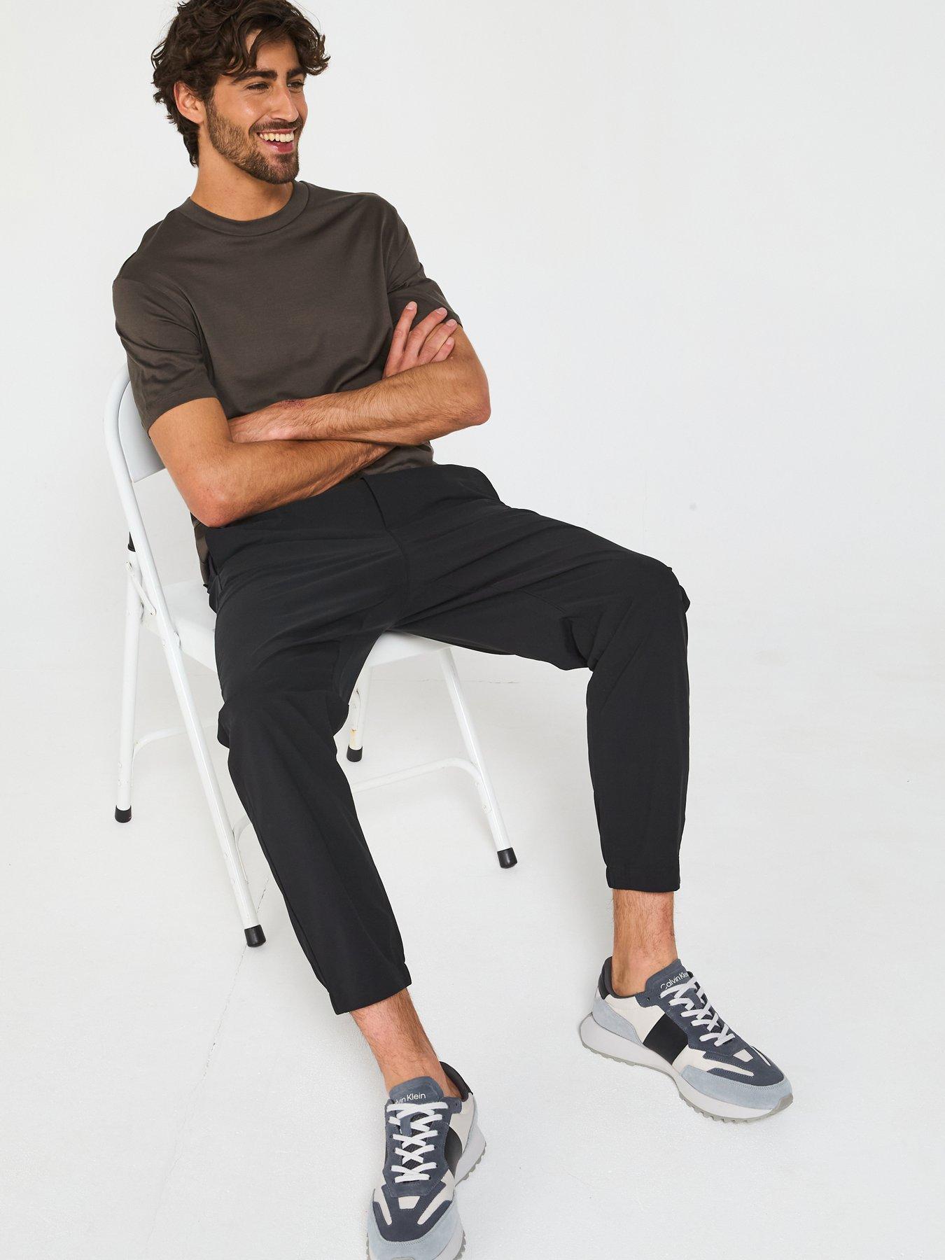 Image 6 of 6 of Calvin Klein Tech Slim Pull-On Trousers - Black