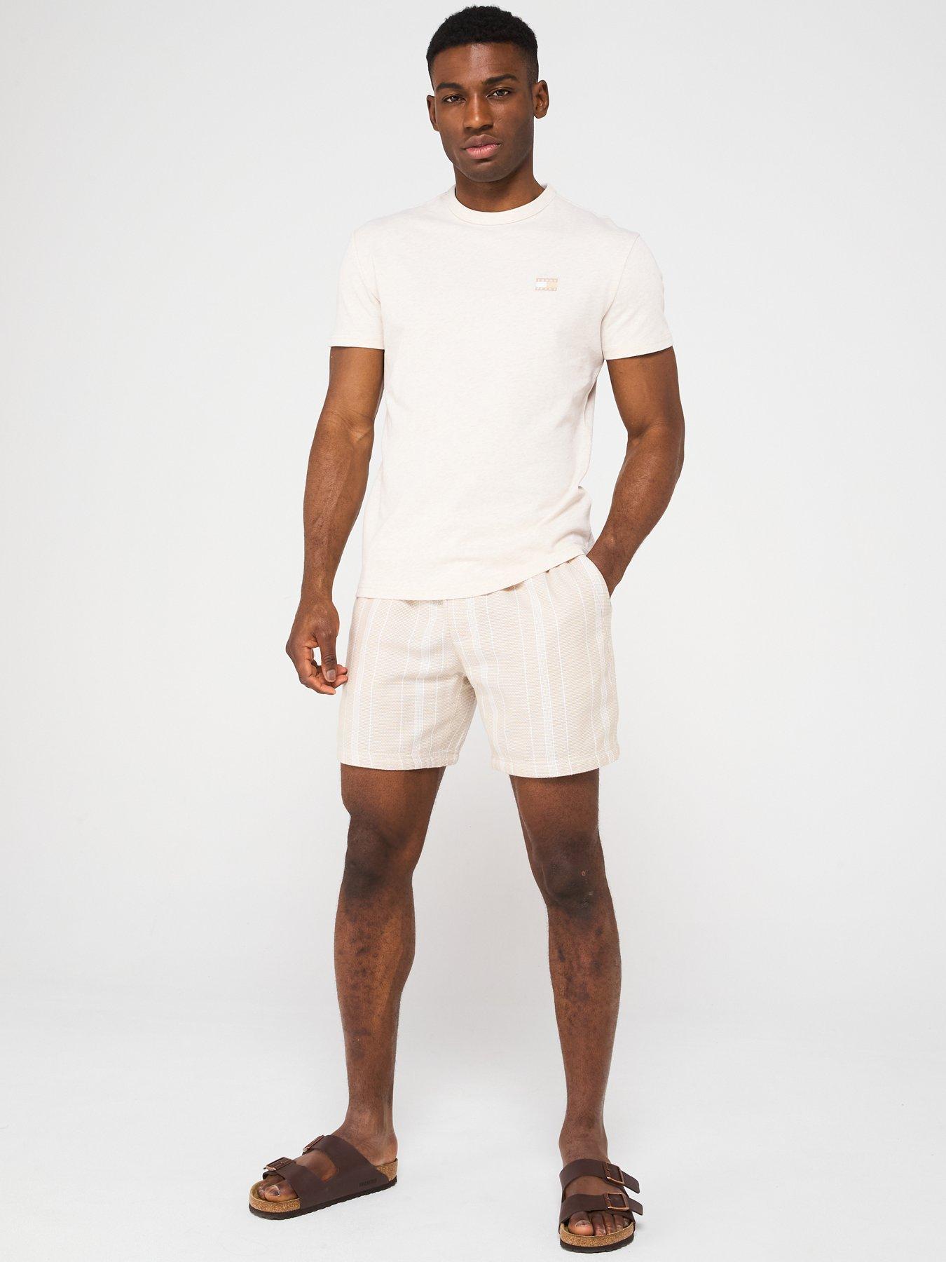 Image 3 of 4 of Tommy Jeans Regular Fit Badge T-Shirt - Light Beige