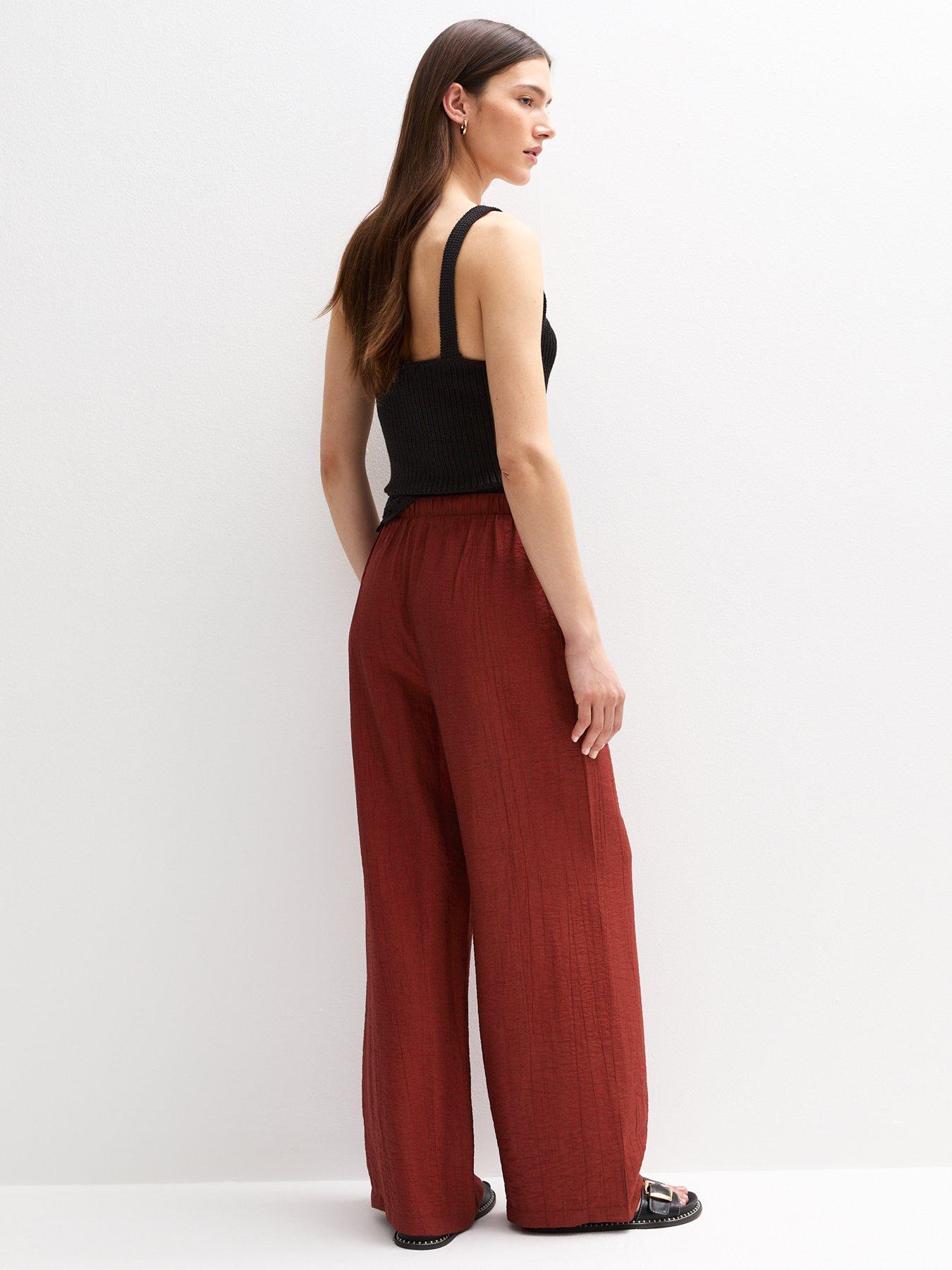 Image 2 of 5 of New Look Crinkled Wide Leg Trousers - Dark Red