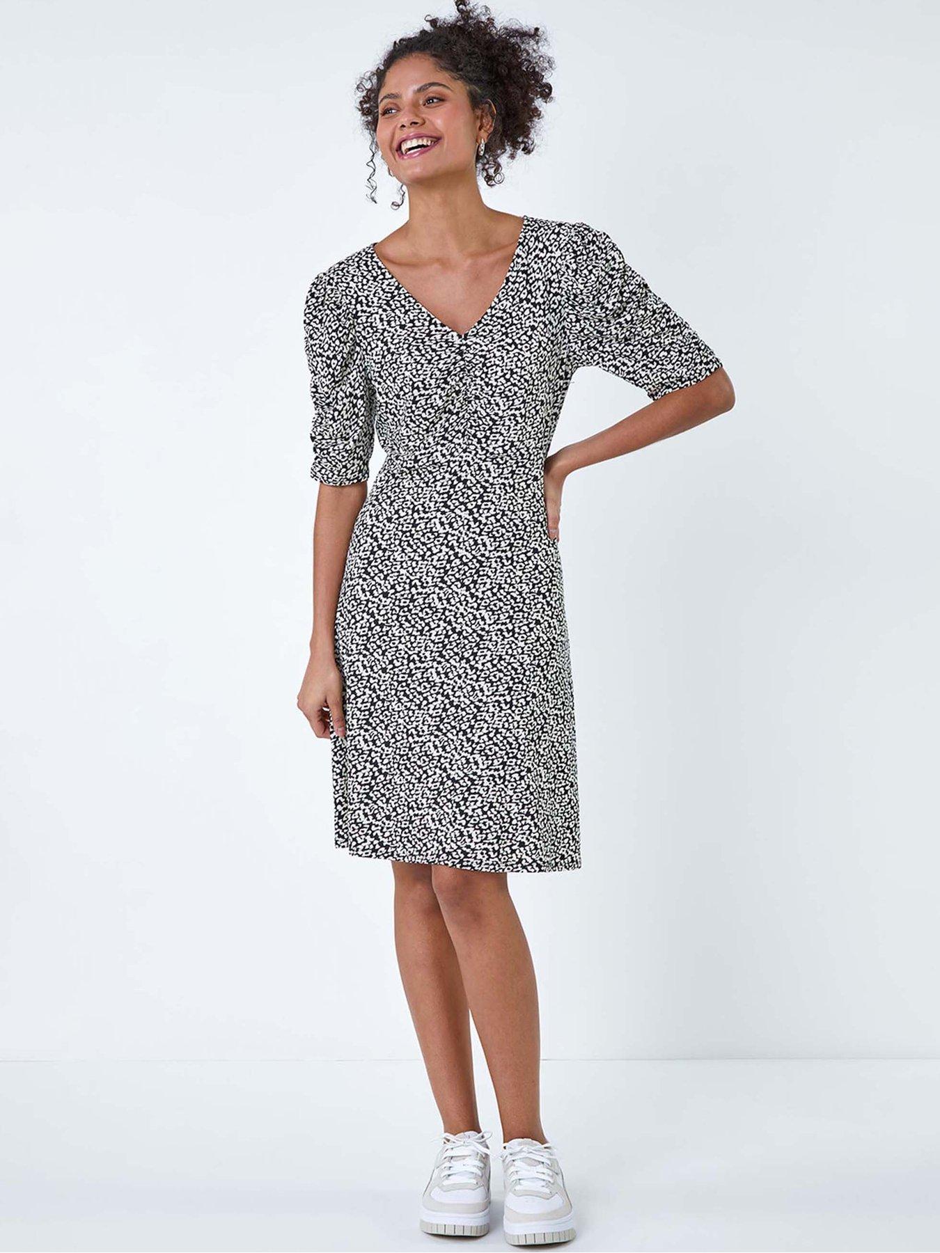 Image 1 of 5 of Roman Ditsy Floral Ruched Puff Sleeve Dress