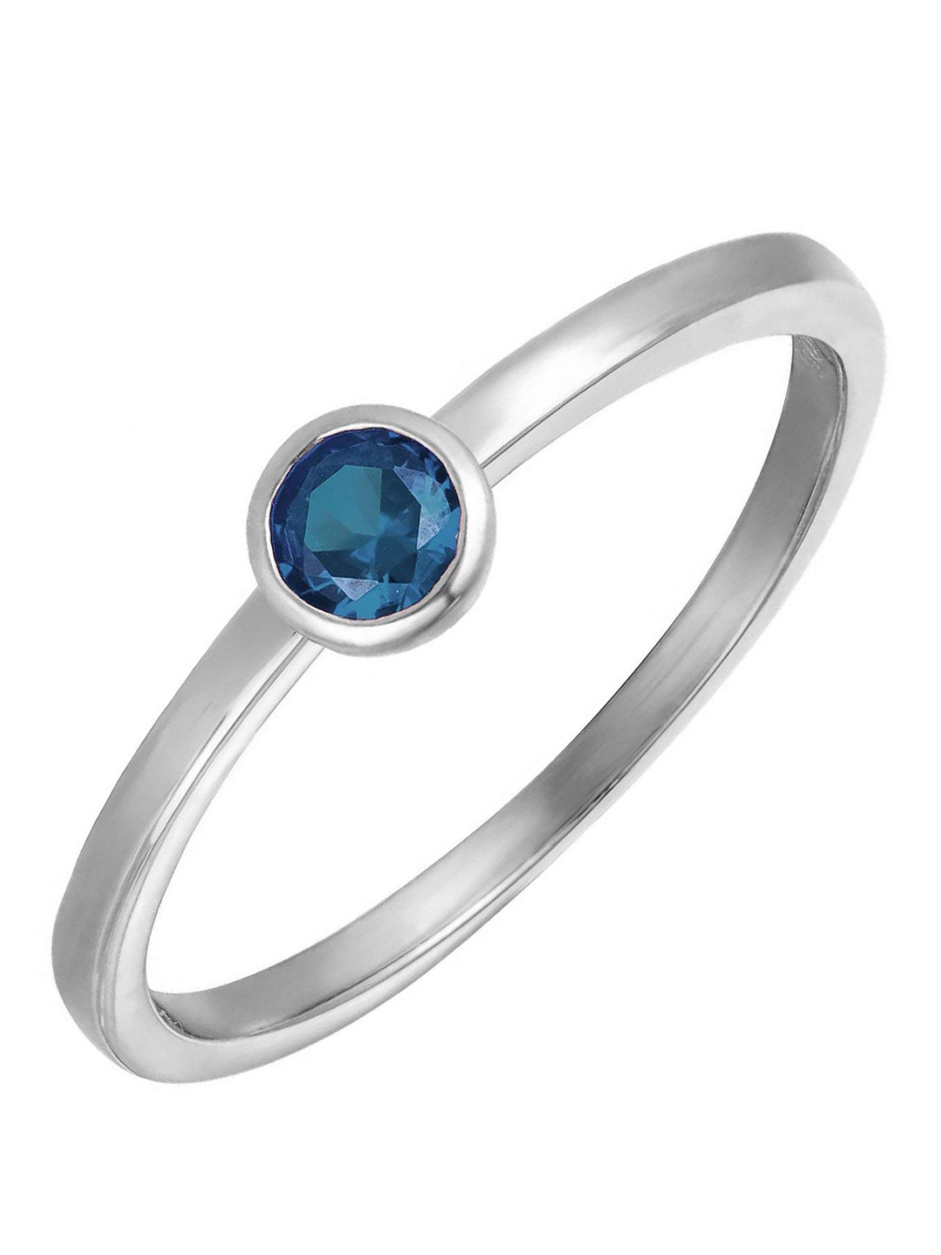 The Love Collection Sterling Silver Birthstone CZ Rubover Ring