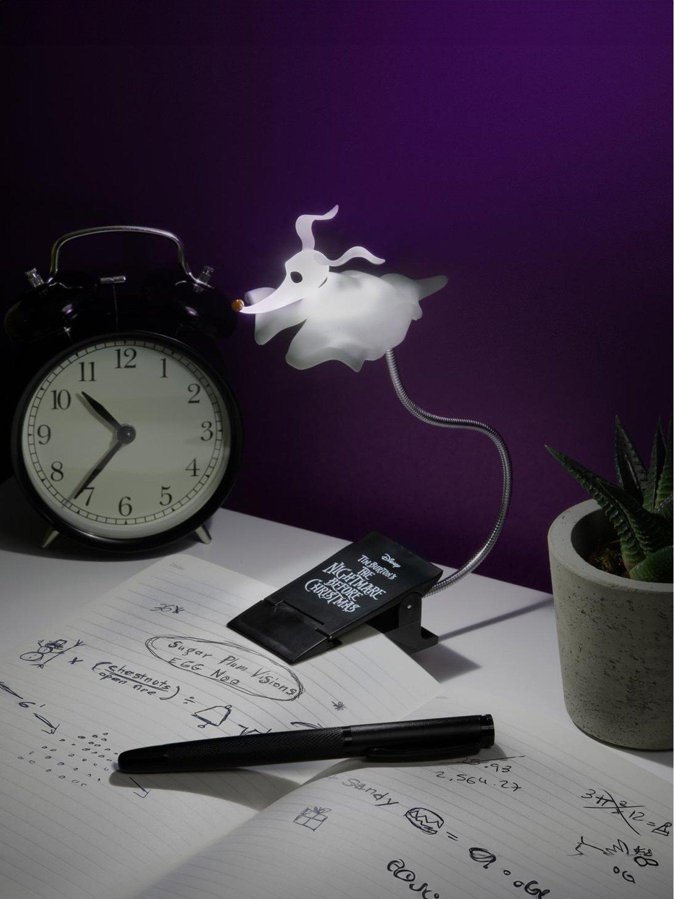Product photograph of Zero Ghost Dog Clip Book Light - Officially Licensed Nightmare Before Christmas Merchandise Portable And Flexible Arm With 3 Light Modes For Reading from very.co.uk