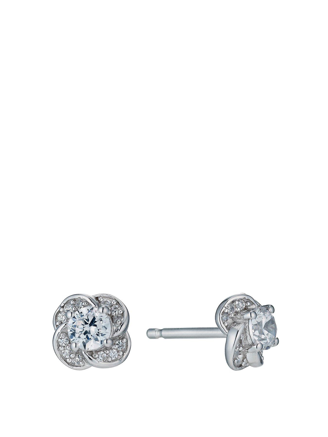 undefined Silver Earrings. Cubic Zirconia Twisted Flower Stud Earrings