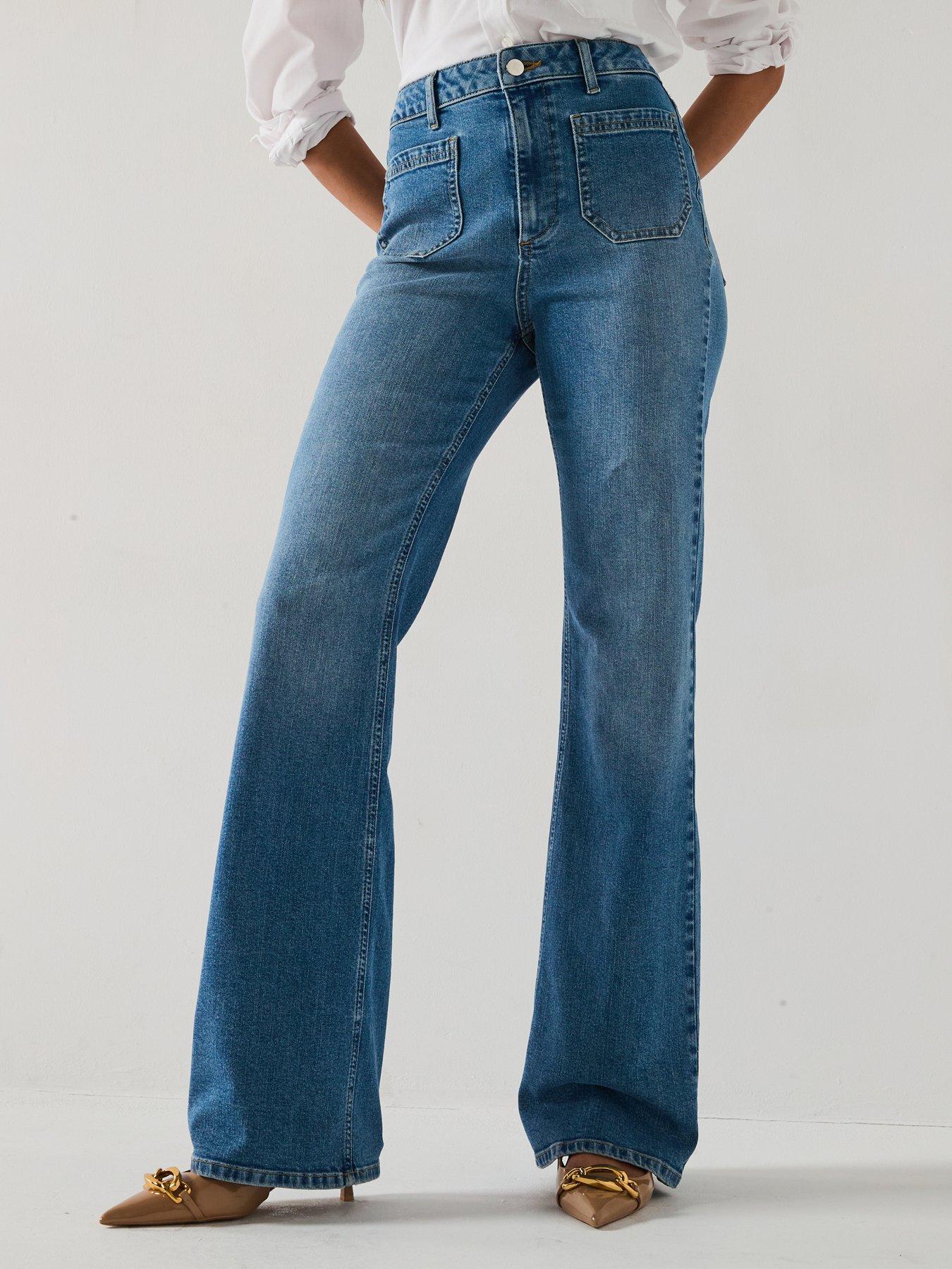 undefined Flare Jeans With Front Patch Pockets - Mid Wash