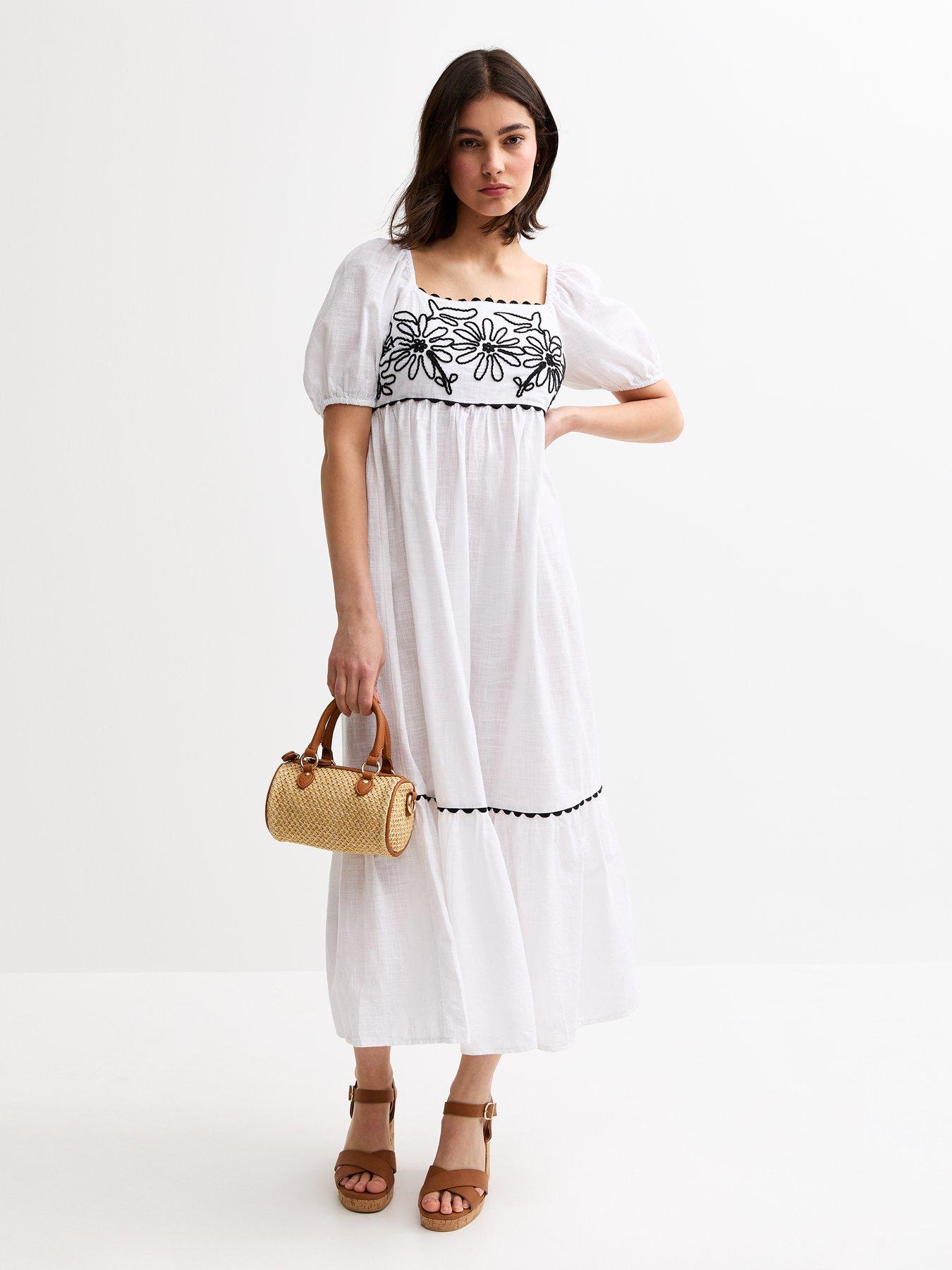 Image 1 of 4 of New Look White Floral Embroidered Smock Midi Dress