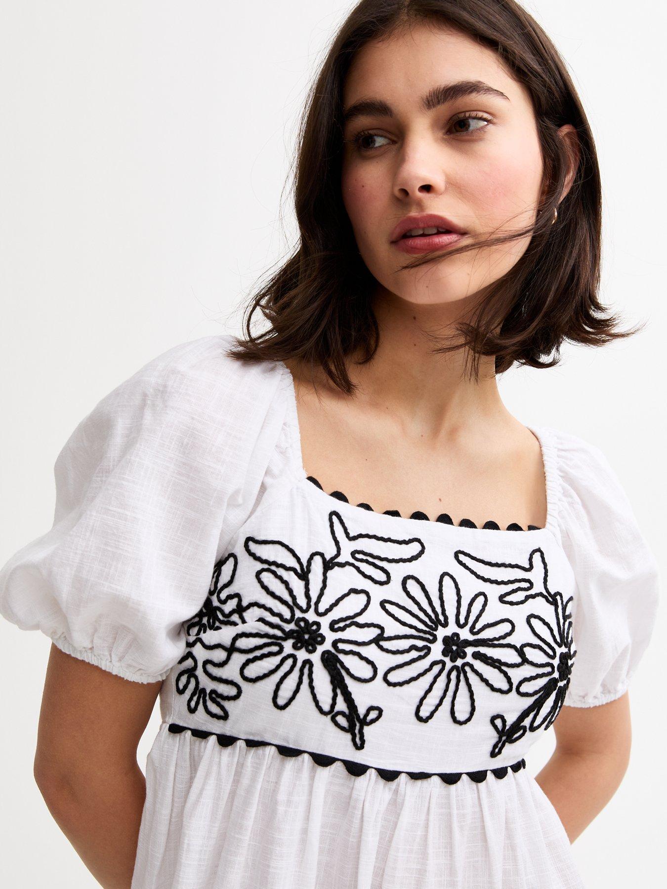 Image 4 of 4 of New Look White Floral Embroidered Smock Midi Dress