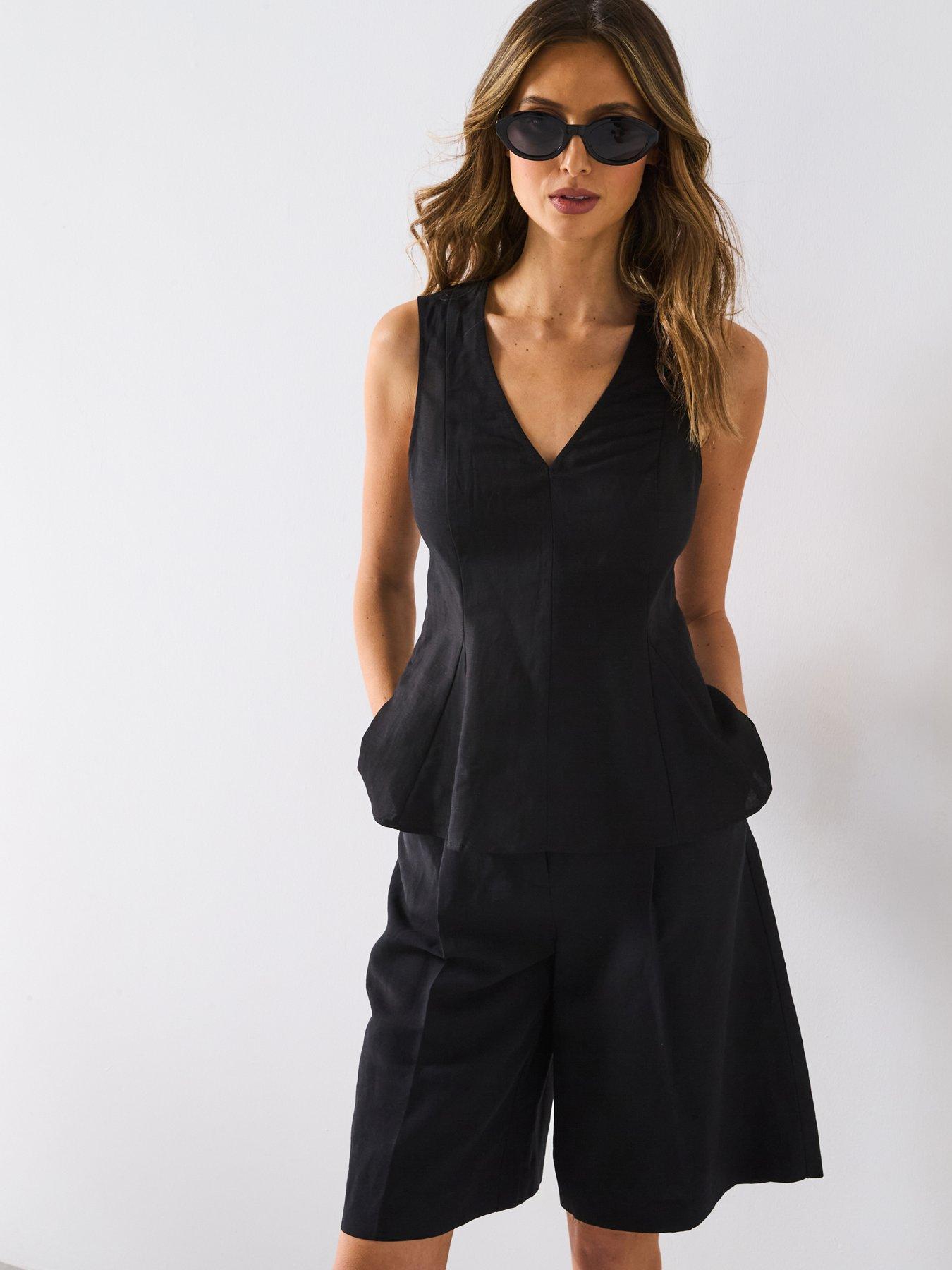 undefined Linen Blend Peplum Top - Black