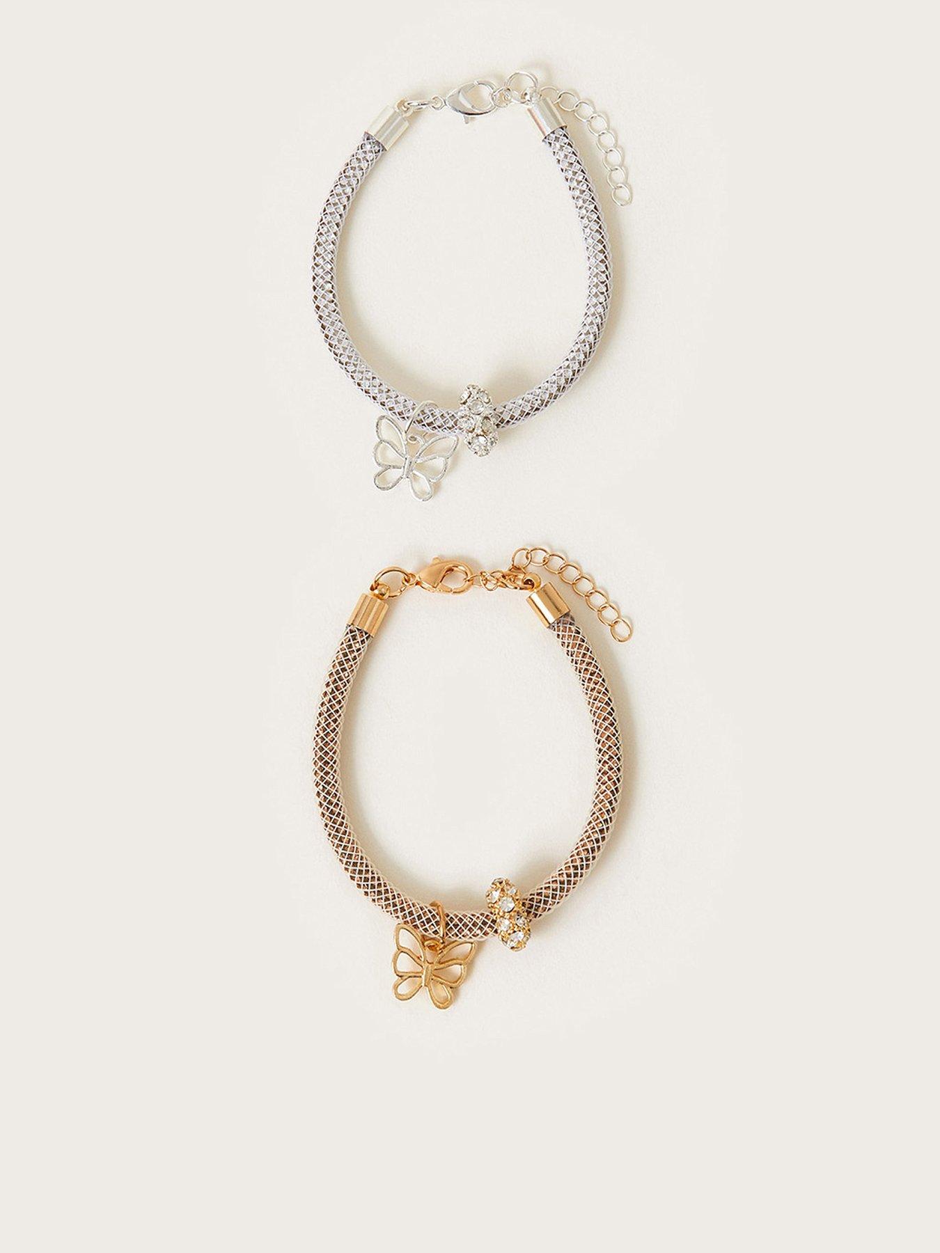 Product photograph of Monsoon Girls 2-pack Diamante Butterfly Tube Bracelets - Gold from very.co.uk