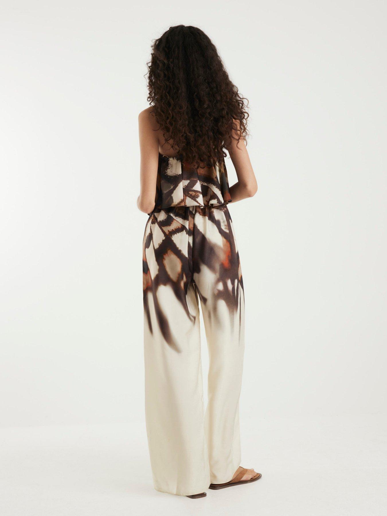 Image 2 of 4 of River Island Butterfly Printed Jumpsuit - Cream