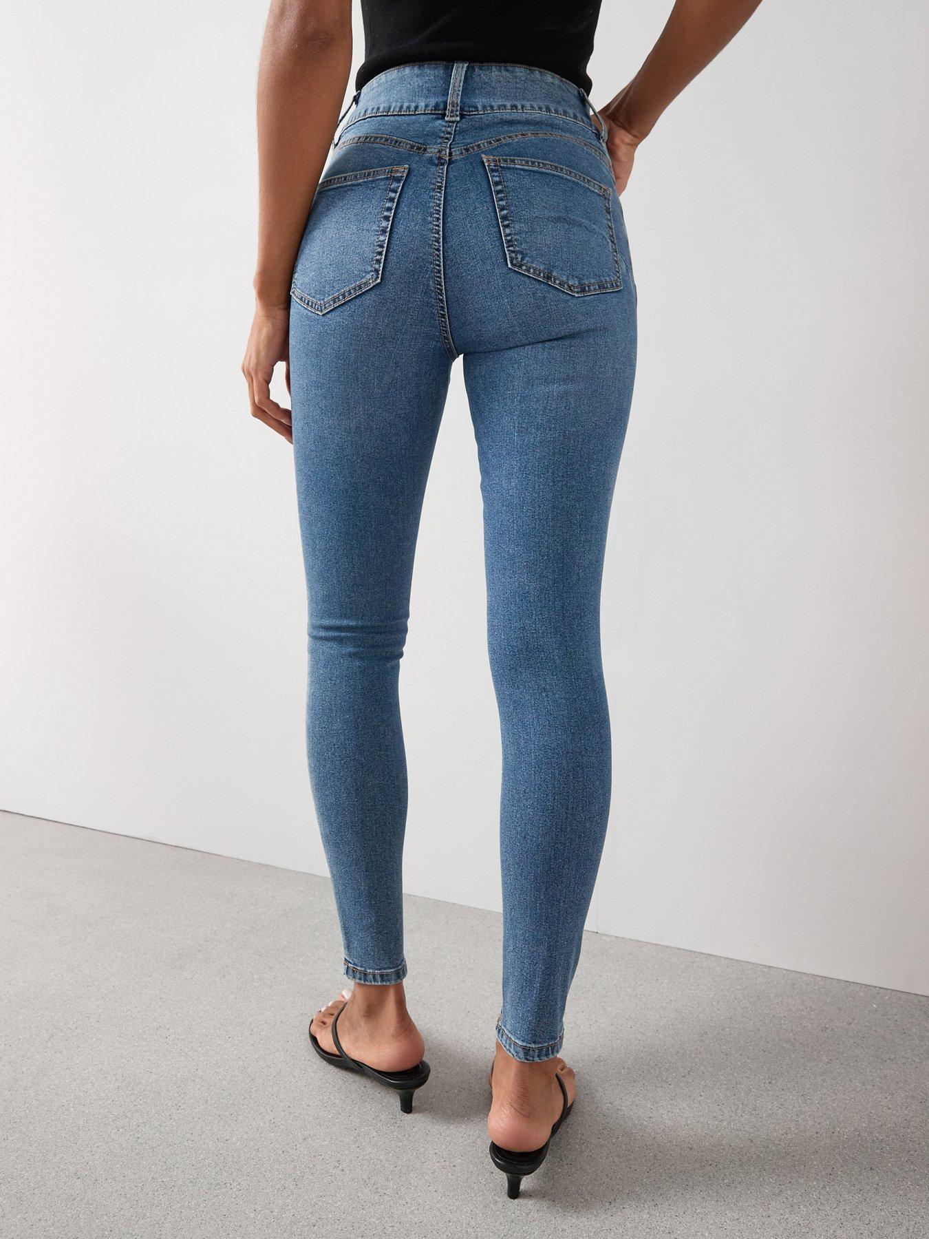 Image 2 of 7 of The Very Collection Shaping Double Button Skinny Jeans - Mid Wash