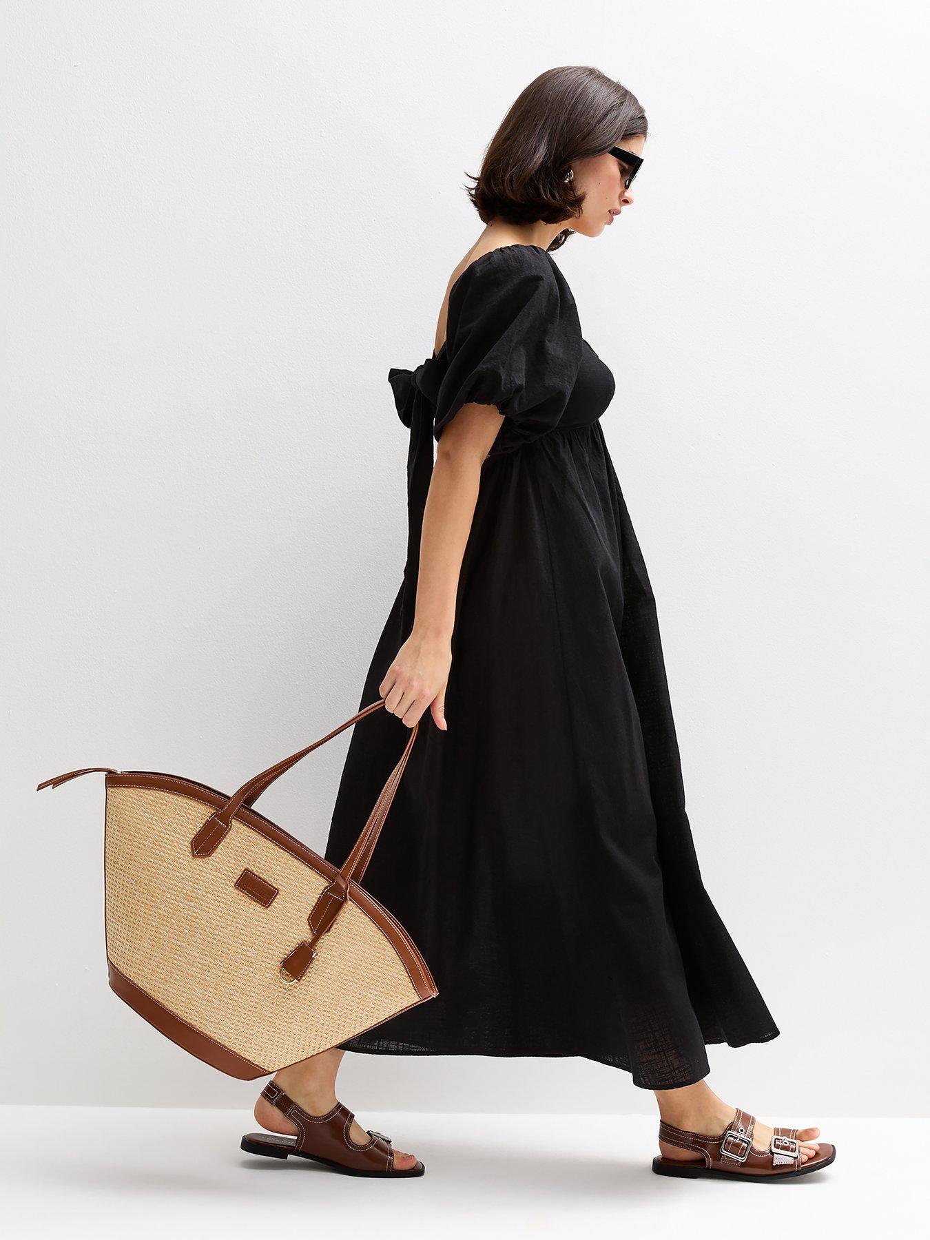 Image 1 of 5 of New Look Puff Sleeve Knotted Front Midi Dress - Black