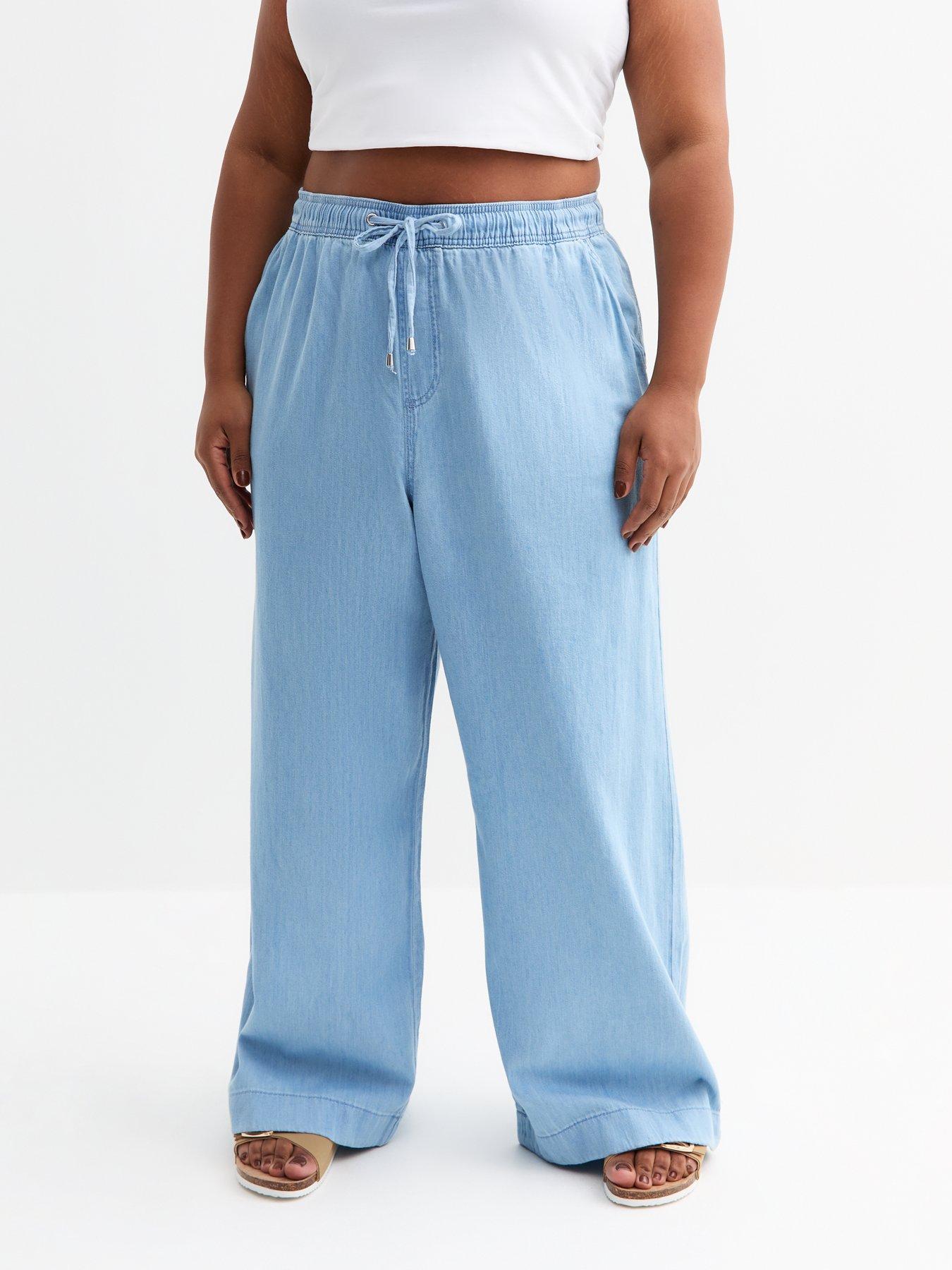 Image 1 of 5 of New Look Curves Light Blue Drawstring Waist Denim Trouser Jeans