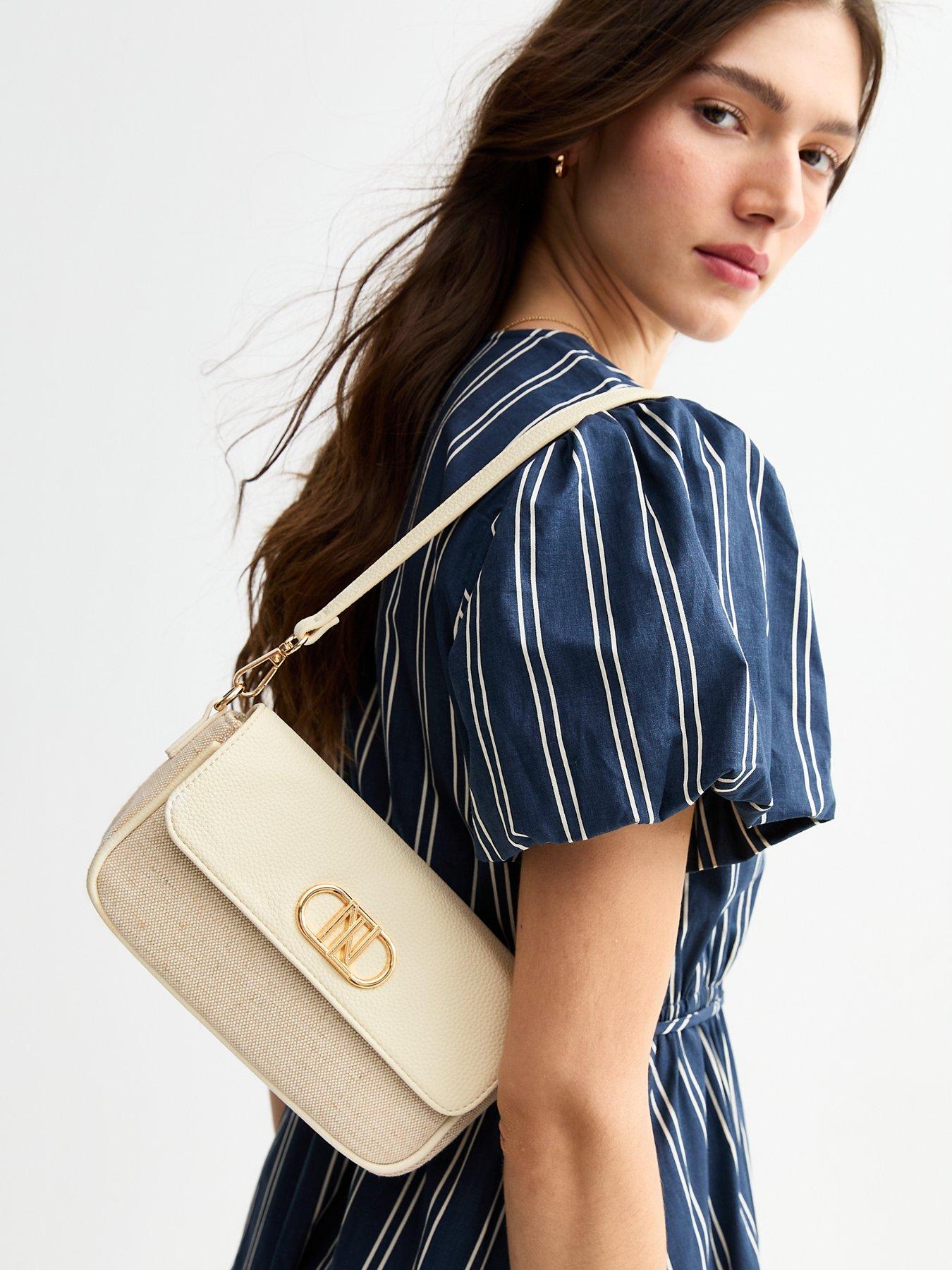 Image 2 of 5 of New Look Cream Canvas Logo Plaque Shoulder Bag