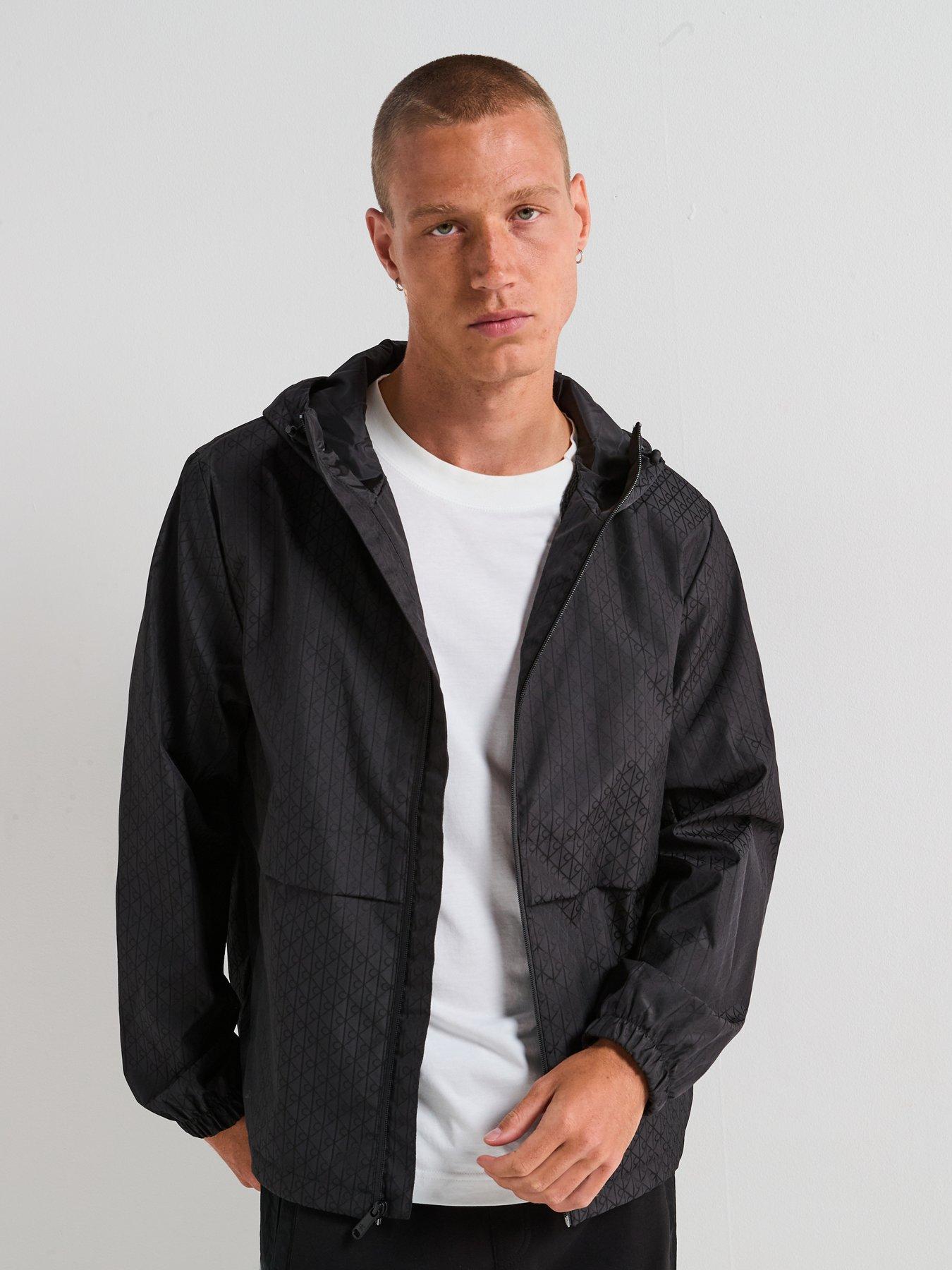 Image 1 of 6 of Calvin Klein Jeans All Over Print Monochrome Windbreaker Jacket - Black