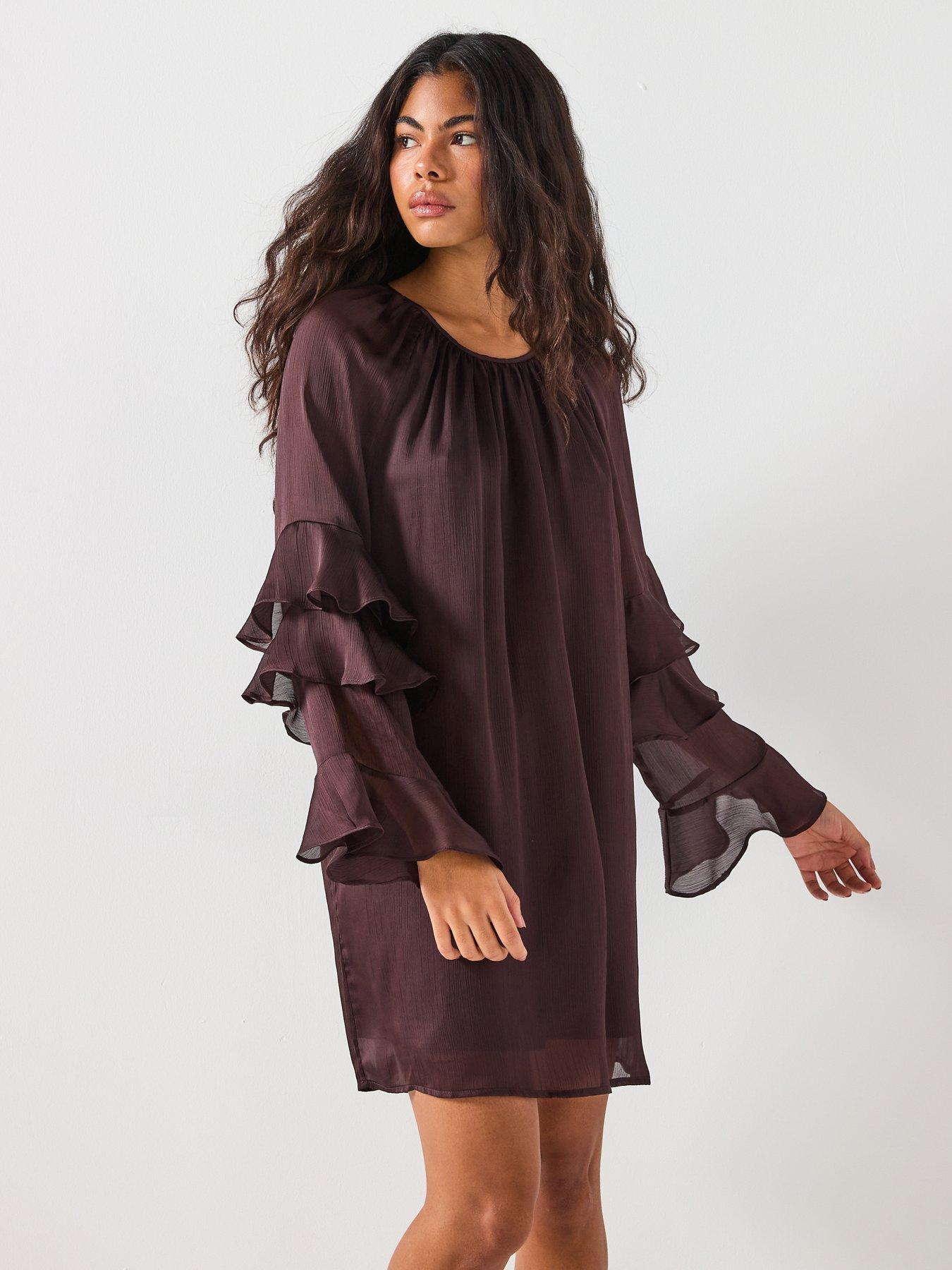 Image 1 of 6 of Vero Moda Lola Long Sleeve Frill Mini Dress - Brown