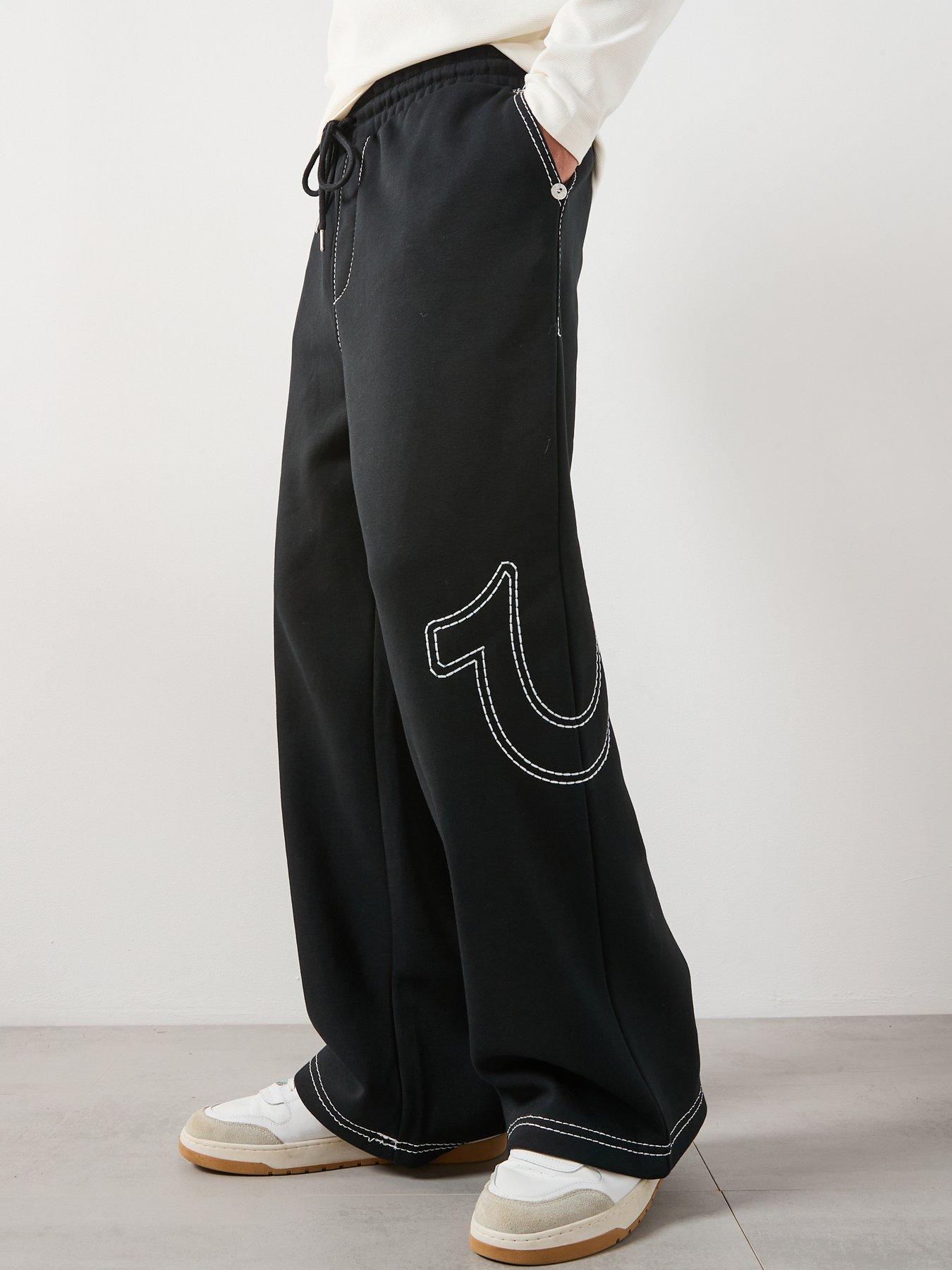 Image 1 of 6 of TRUE RELIGION Stitch Detail Baggy Joggers - Black