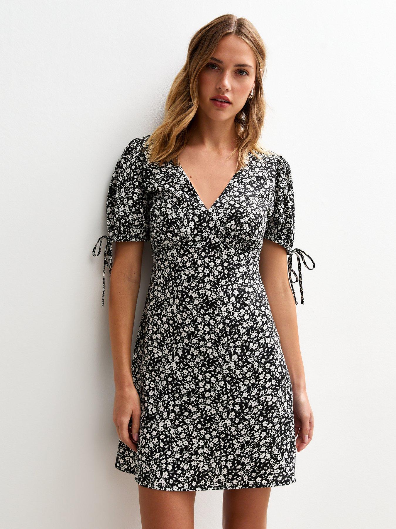 undefined Black Daisy Print V-neck Mini Dress