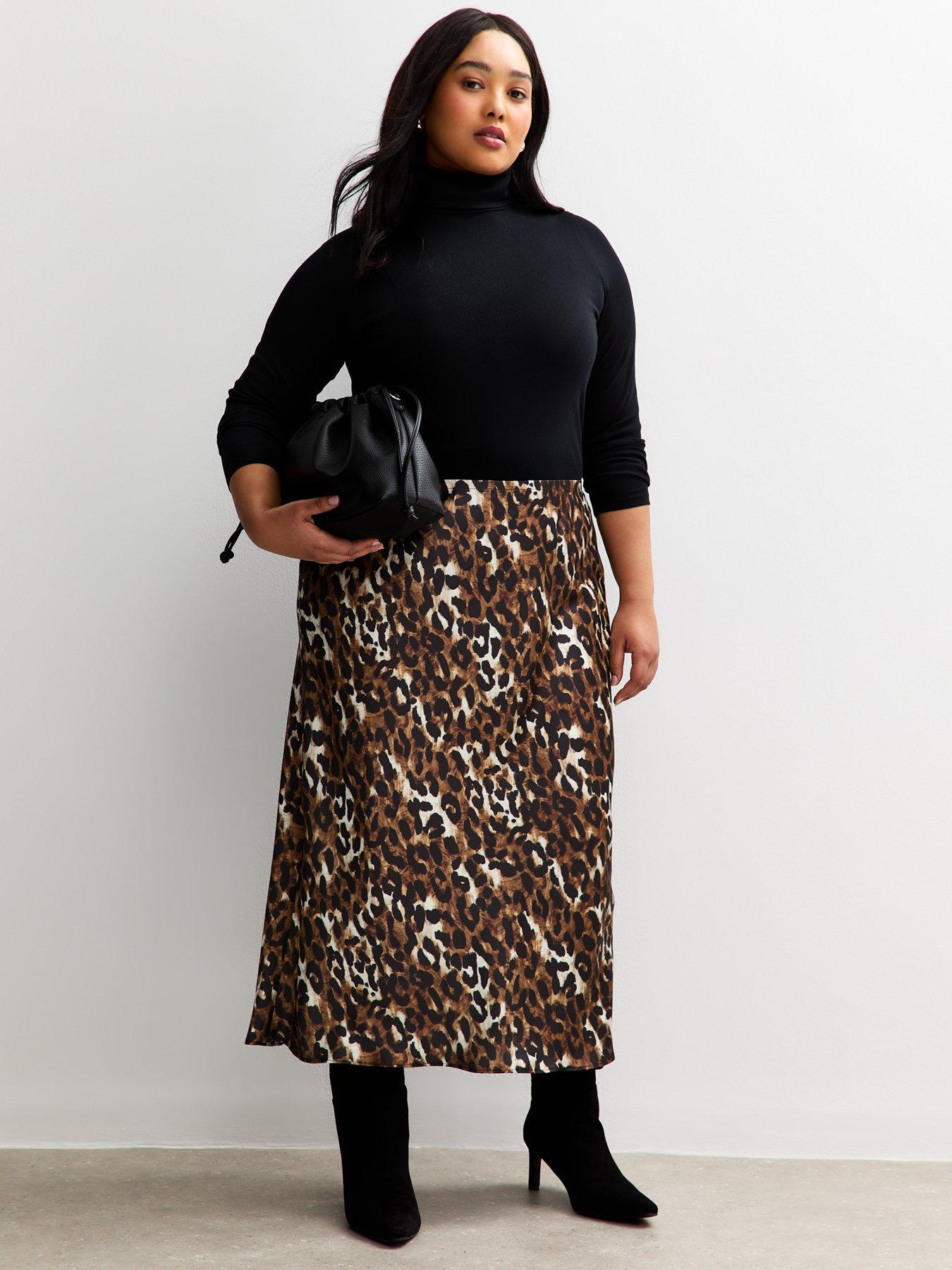 Image 1 of 5 of New Look Curves Brown Leopard Print Bias Cut Midi Skirt