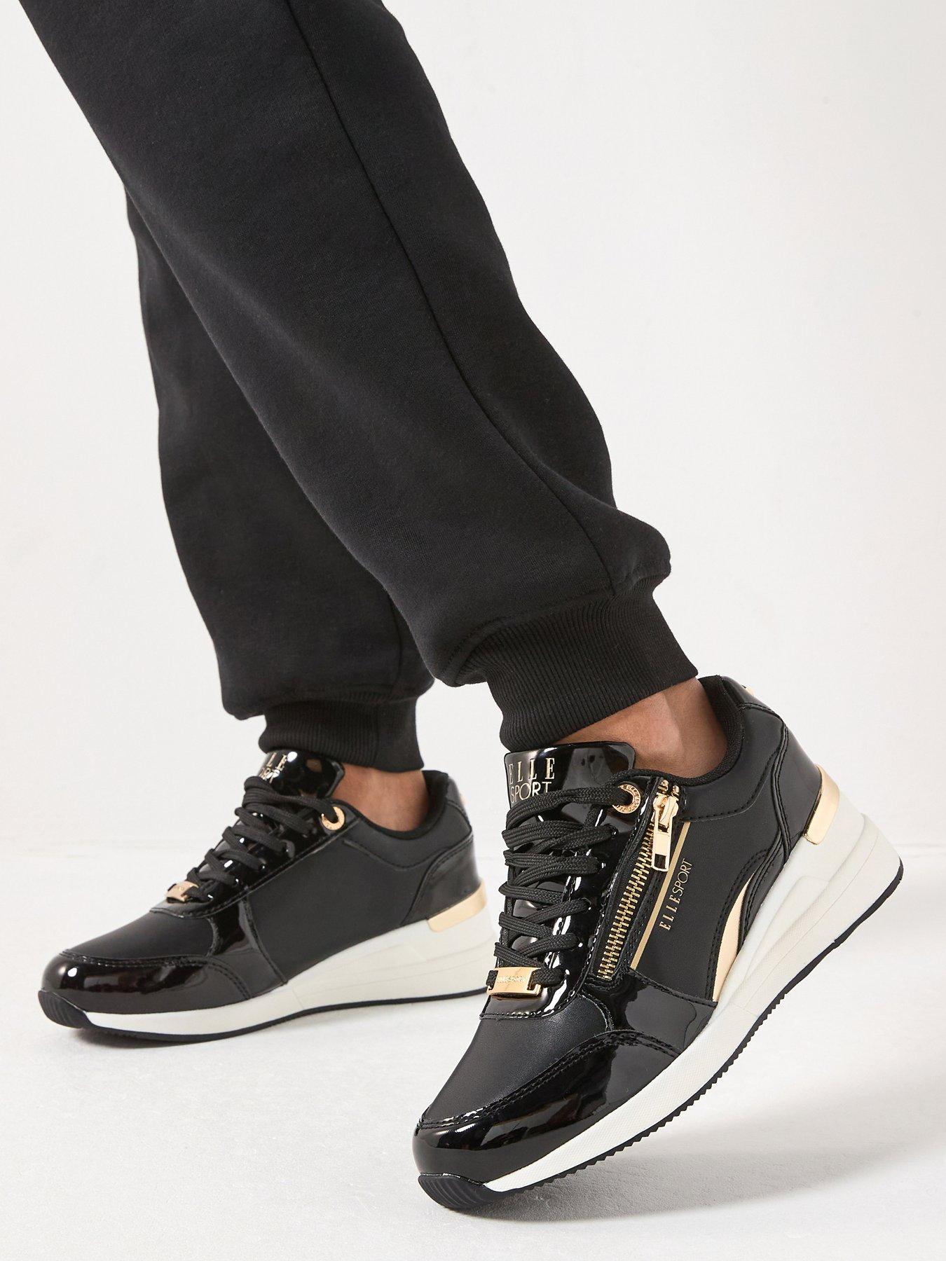 Image 1 of 7 of Elle Sport Elle Sports Lace Up Wedge Trainer - Black