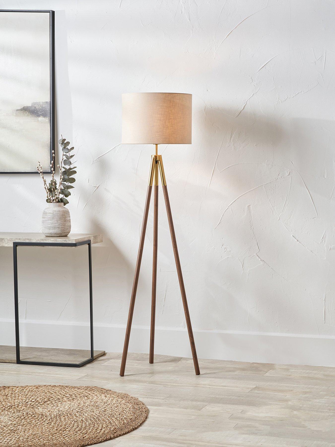 Image 1 of 7 of Pacific Lifestyle Vali Gold Metal and Brown Wood Grain Tripod Floor Lamp