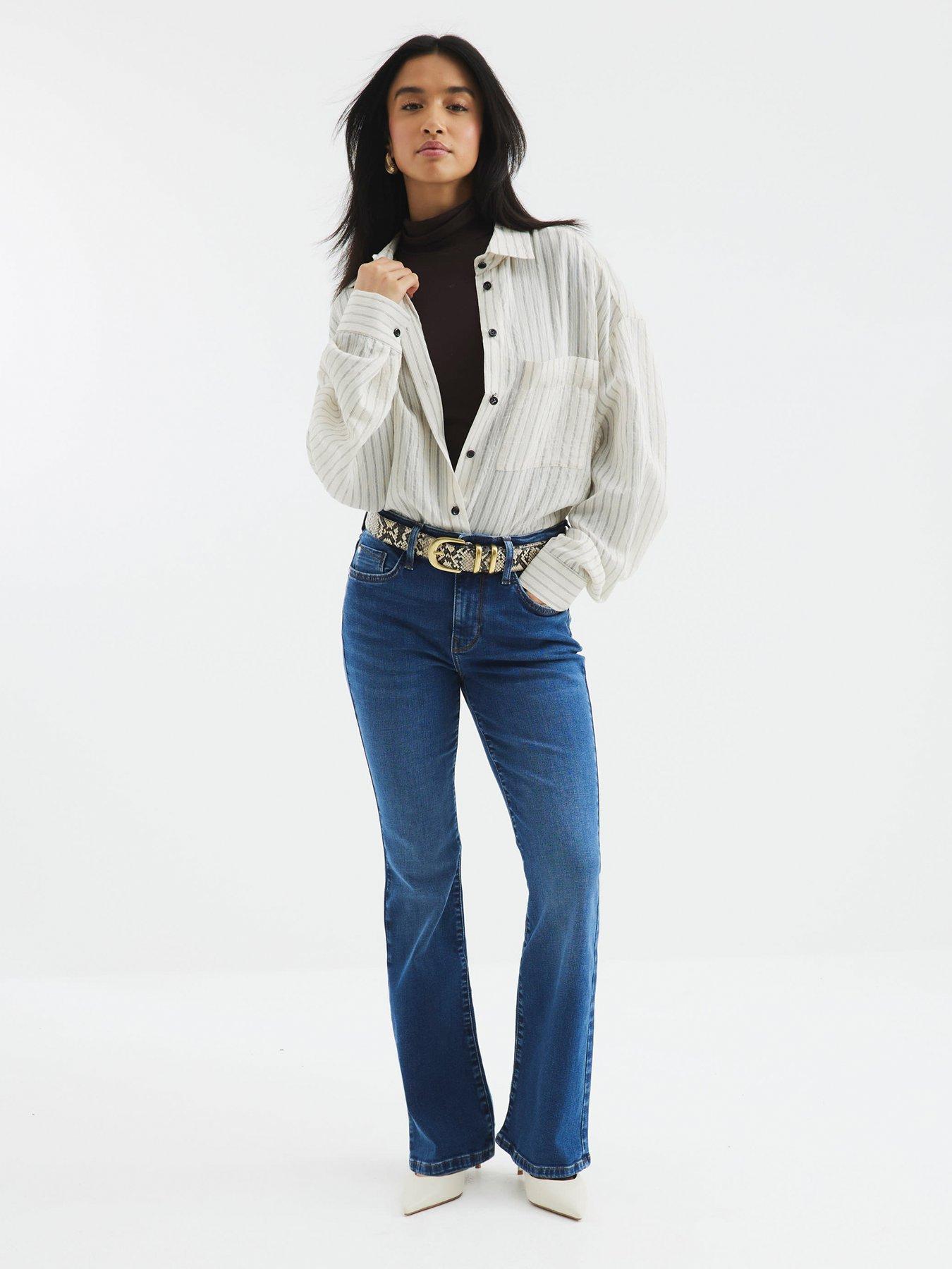 Image 4 of 6 of River Island Petite Mid Rise Bootcut Bea Jeans - Blue