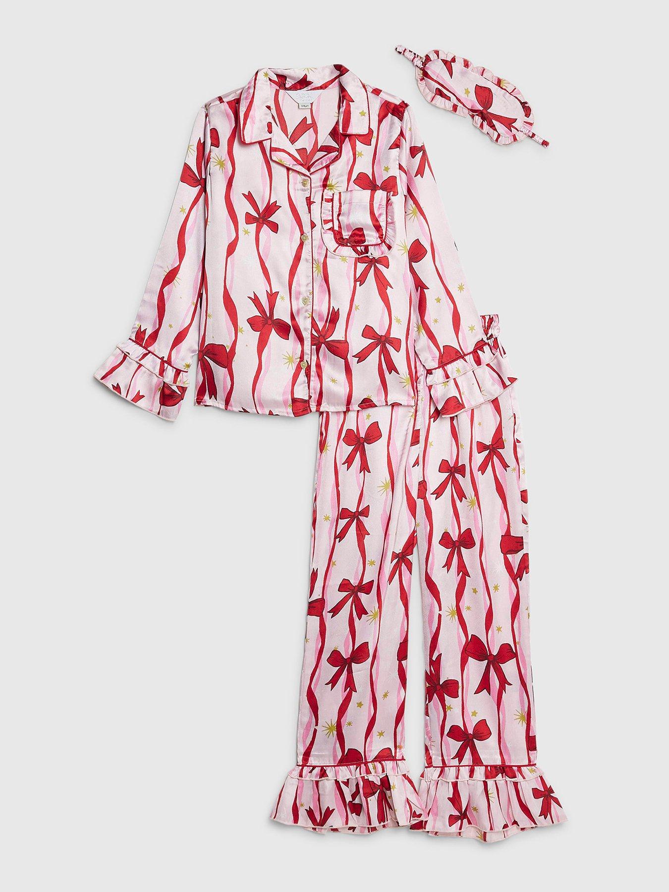Image 1 of 5 of River Island Older Girls Bow Print Satin Pyjamas Set With Scrunchie - Light Pink