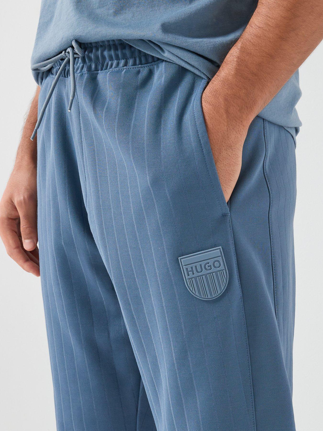 Image 4 of 6 of HUGO Davropant Rib Shield Logo Tracksuit Bottoms - Blue