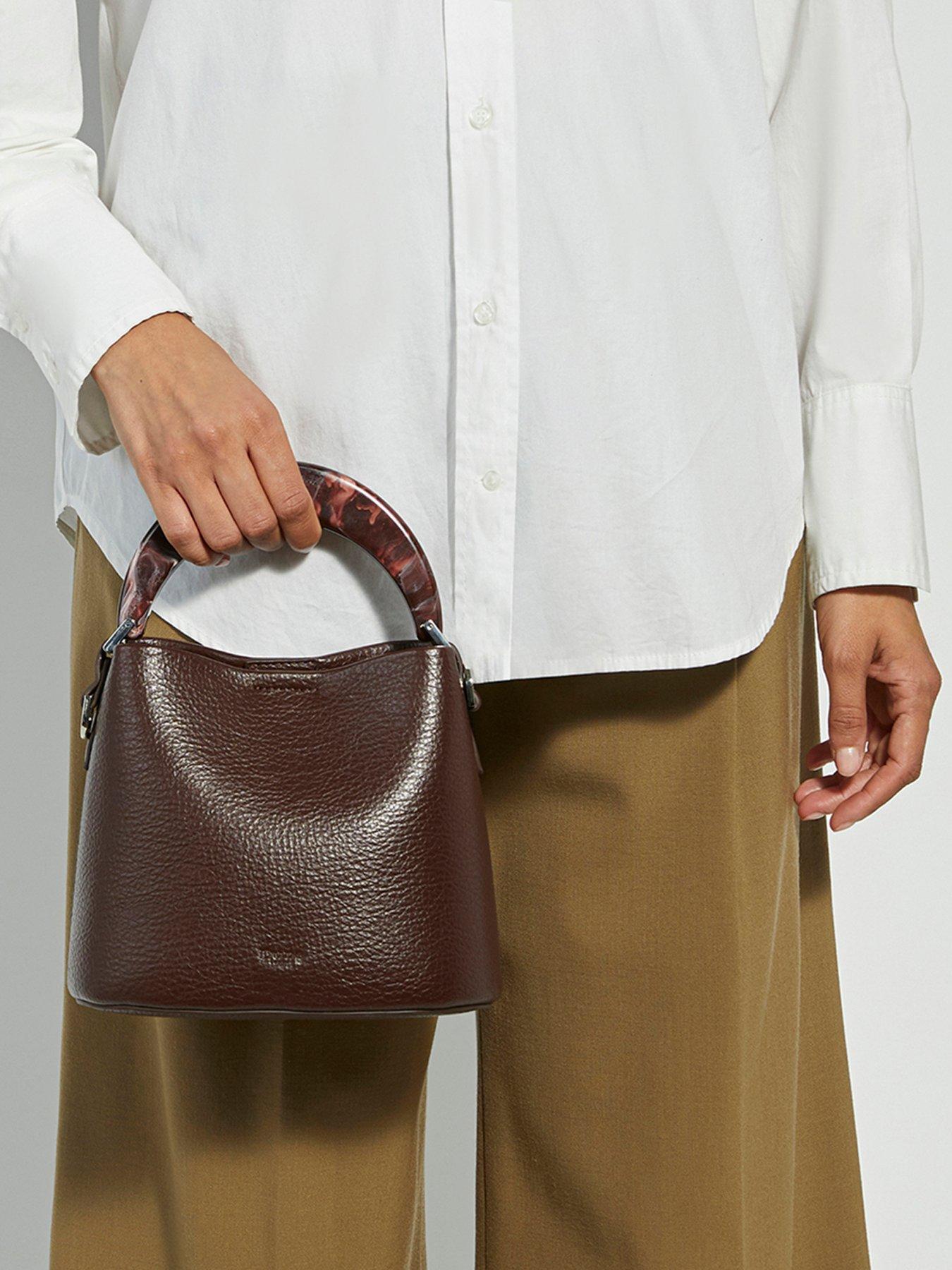 Image 1 of 7 of Dune London Dharla Leather Bucket Bag - Burgundy