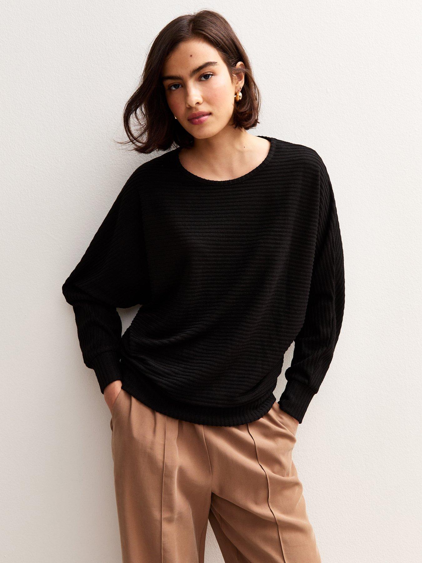 Image 1 of 5 of New Look Soft Touch Ribbed Batwing Sleeve Top - Black