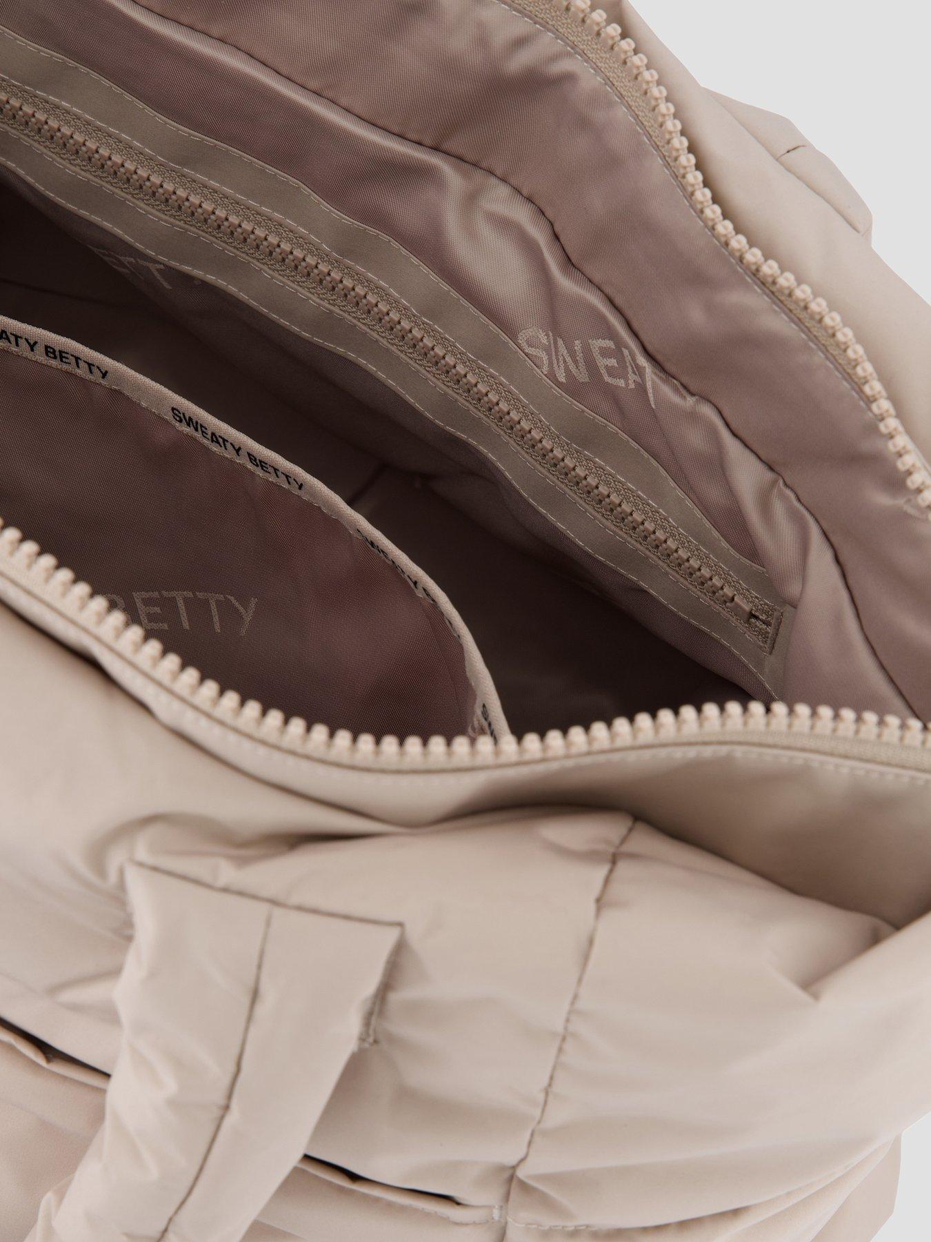 Image 4 of 4 of Sweaty Betty Nimbus Mini Cloud Bag - Dusk Beige