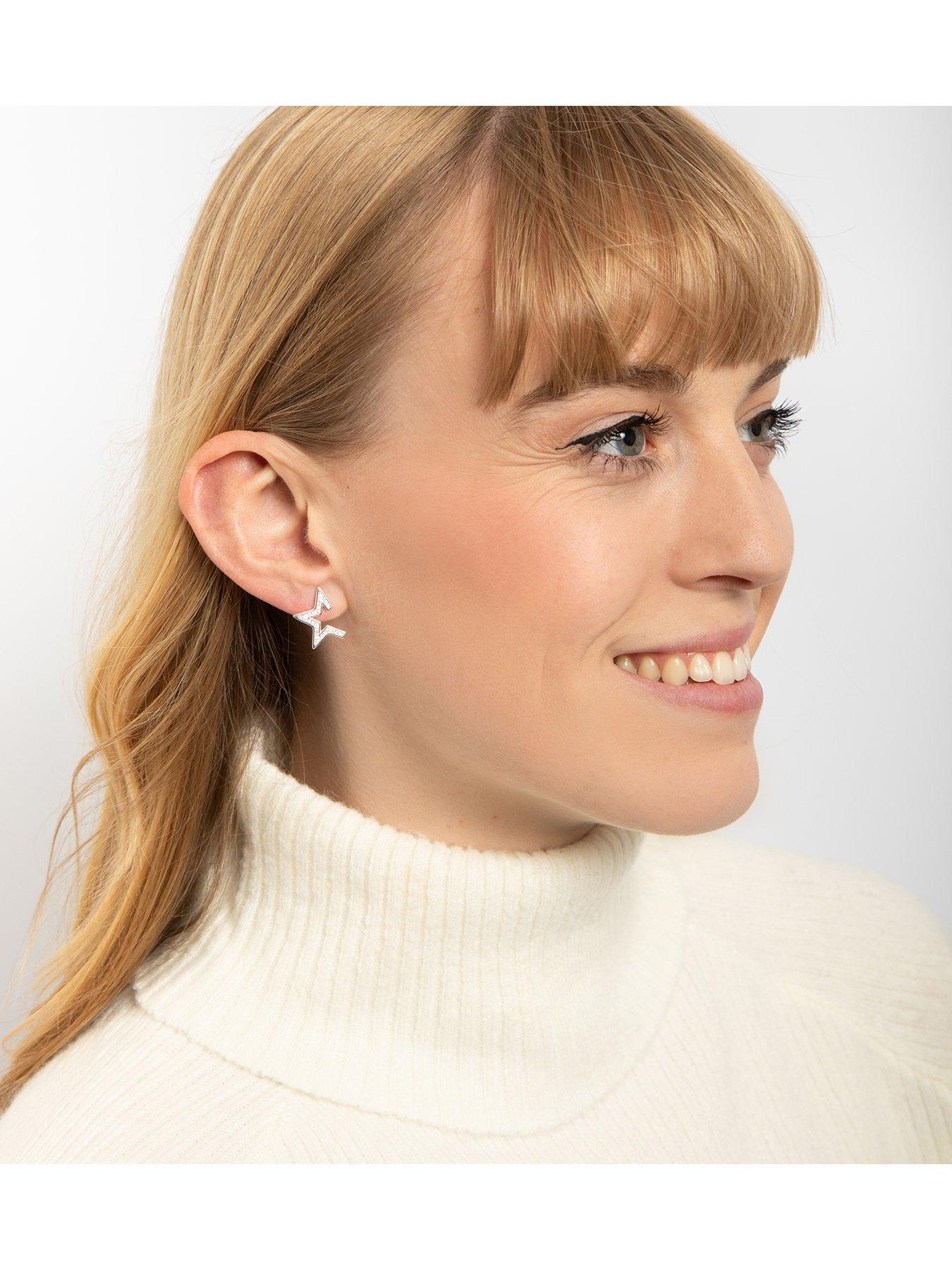 Image 2 of 4 of The Love Collection Sterling Silver Star Burst CZ Studs