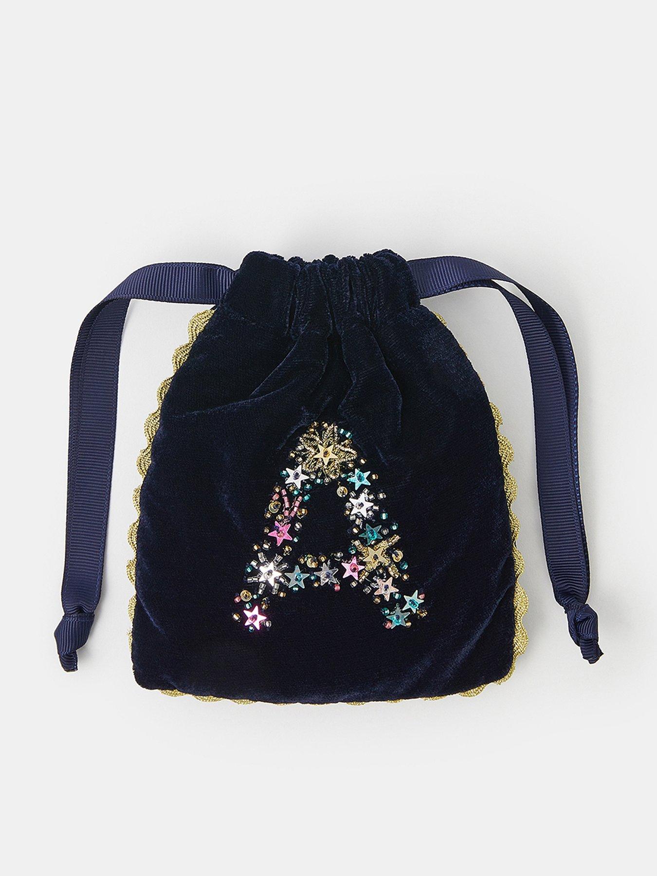 accessorize-initial-drawstring-bag-multi